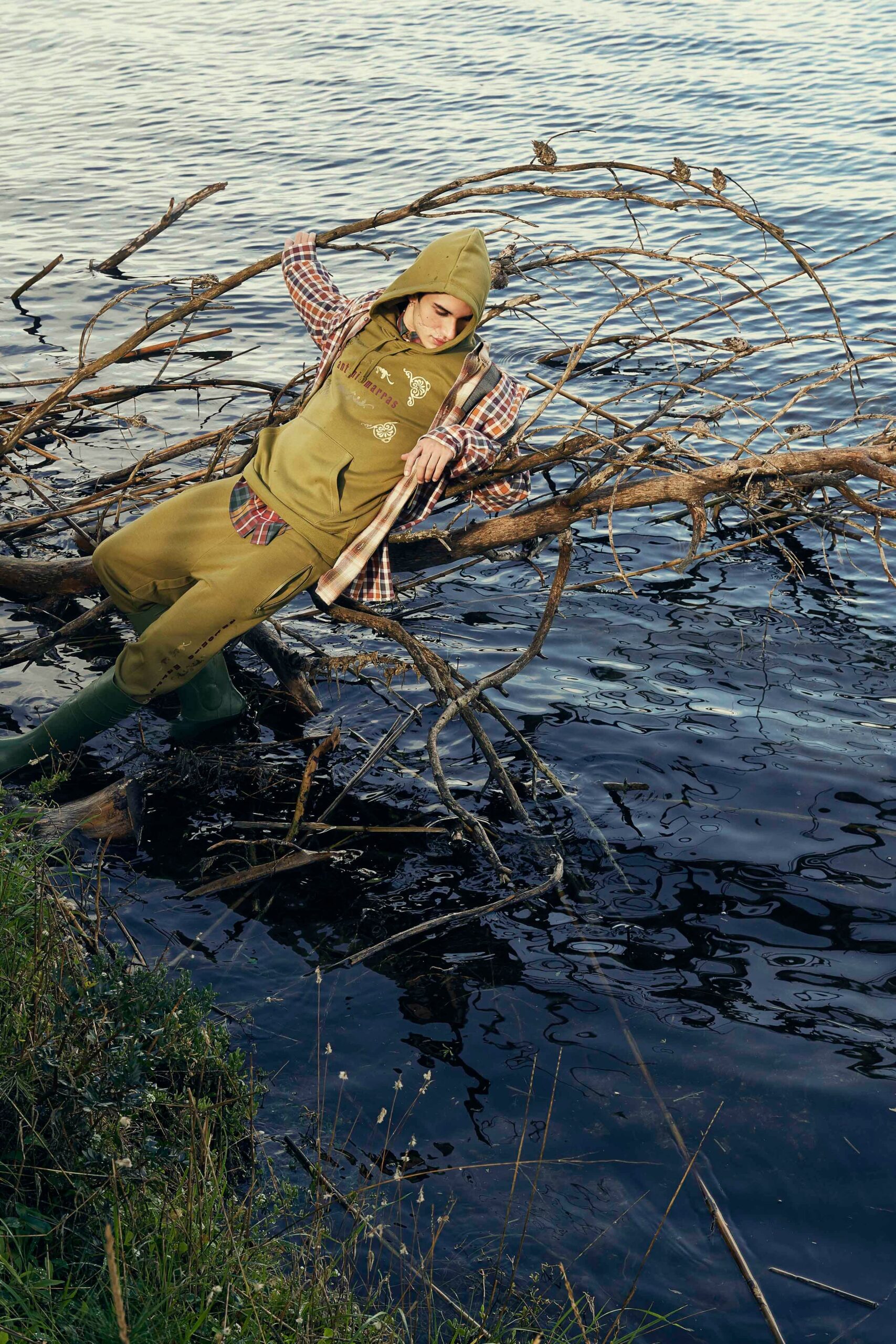 green relaxed jumpsuit with checked shirt