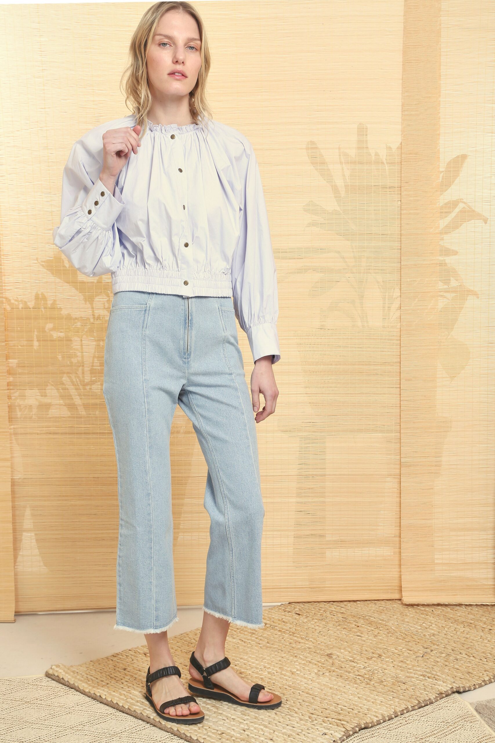 blue cotton long-sleeve collared fitted buttoned ruffled top