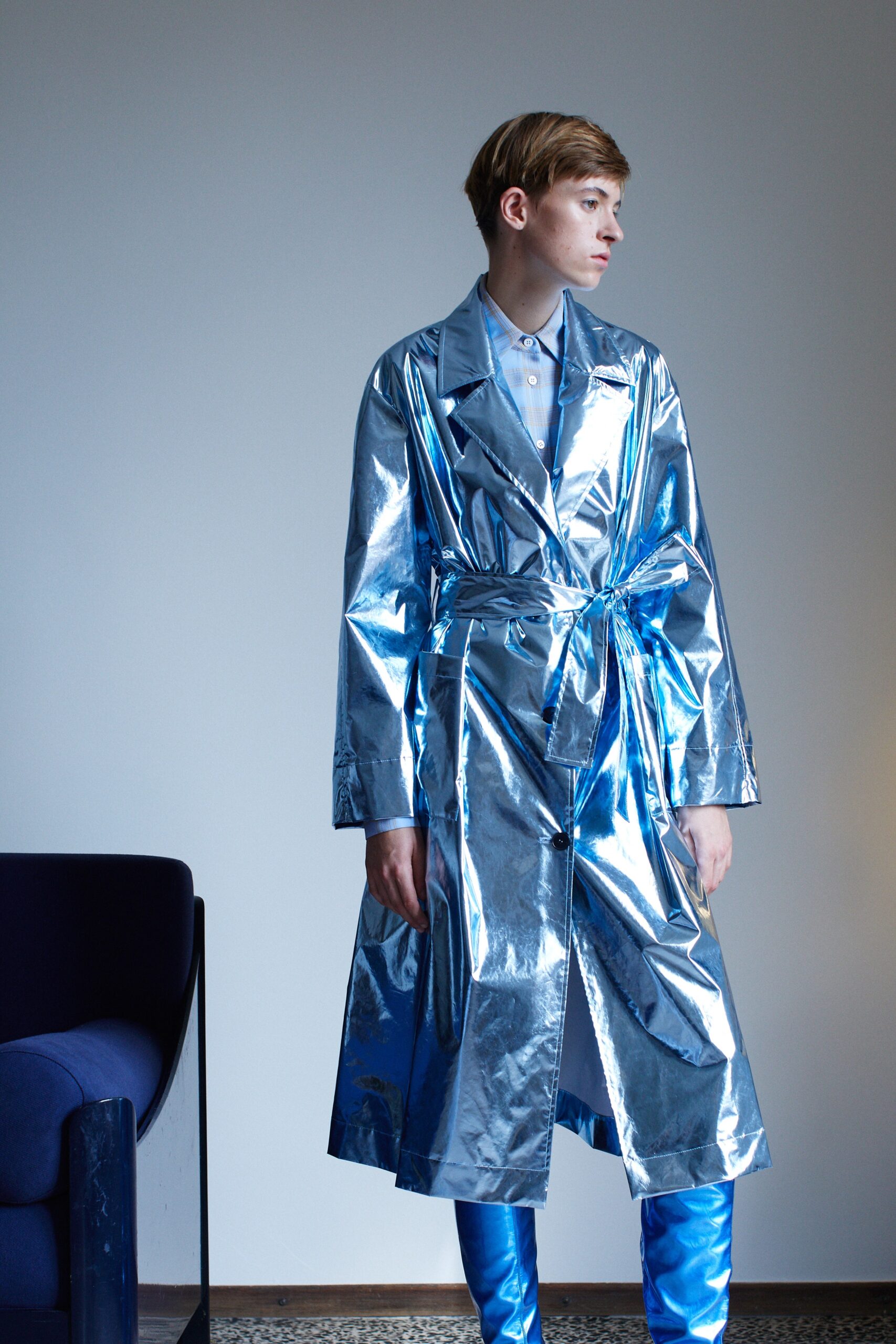 blue vinyl long-sleeve collared fitted zippered shiny trench