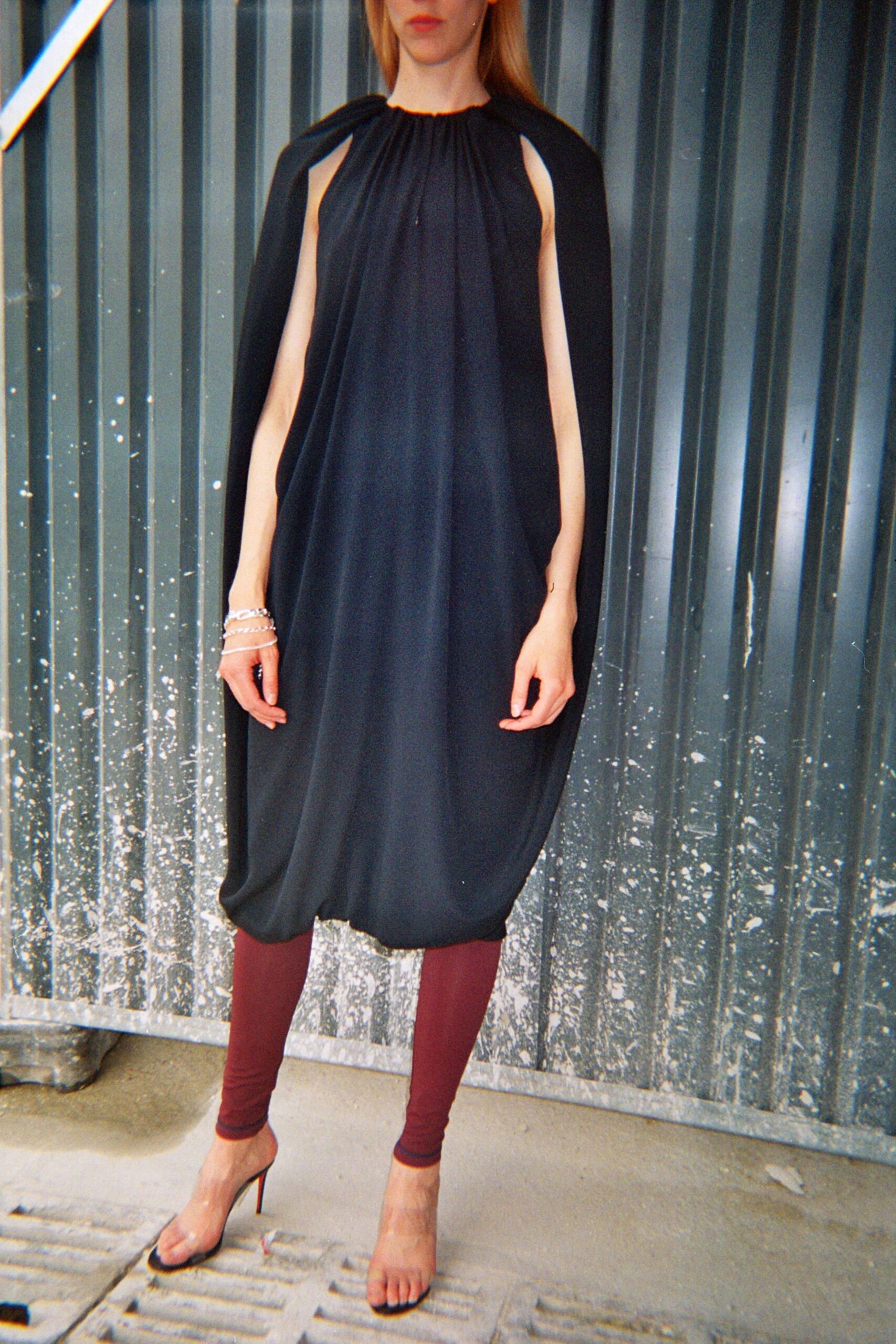 black silk cape with brown pants