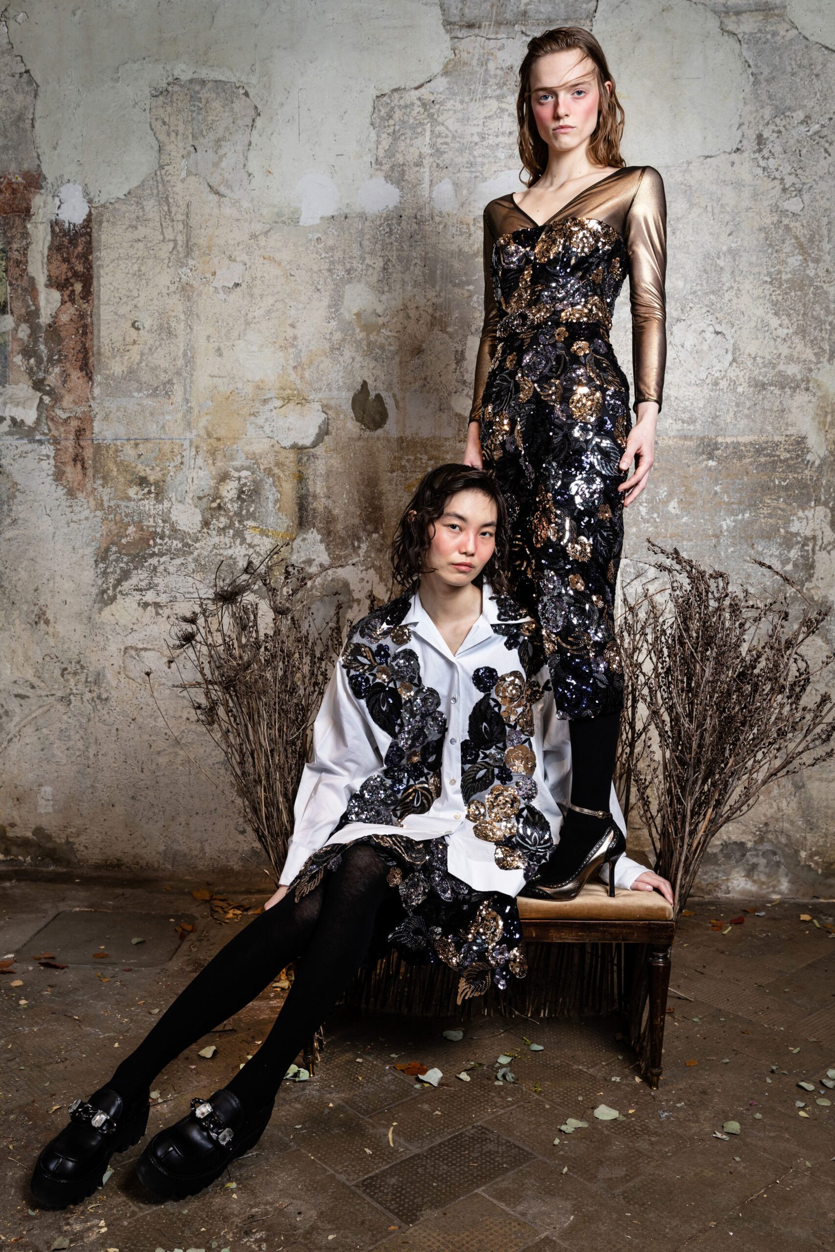 black gold sequined gown and white shirt