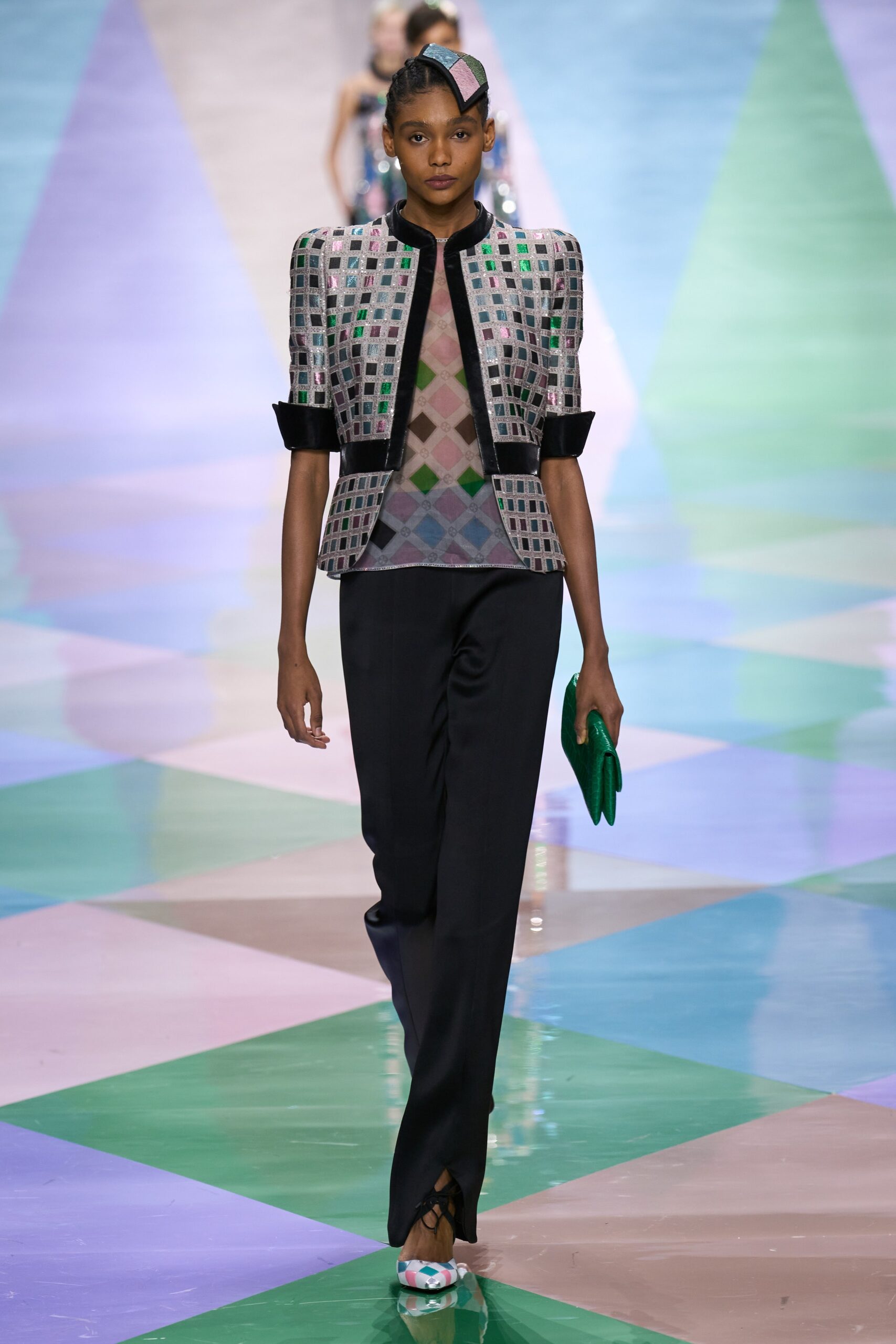 multi-colored fitted jacket with black tailored pants