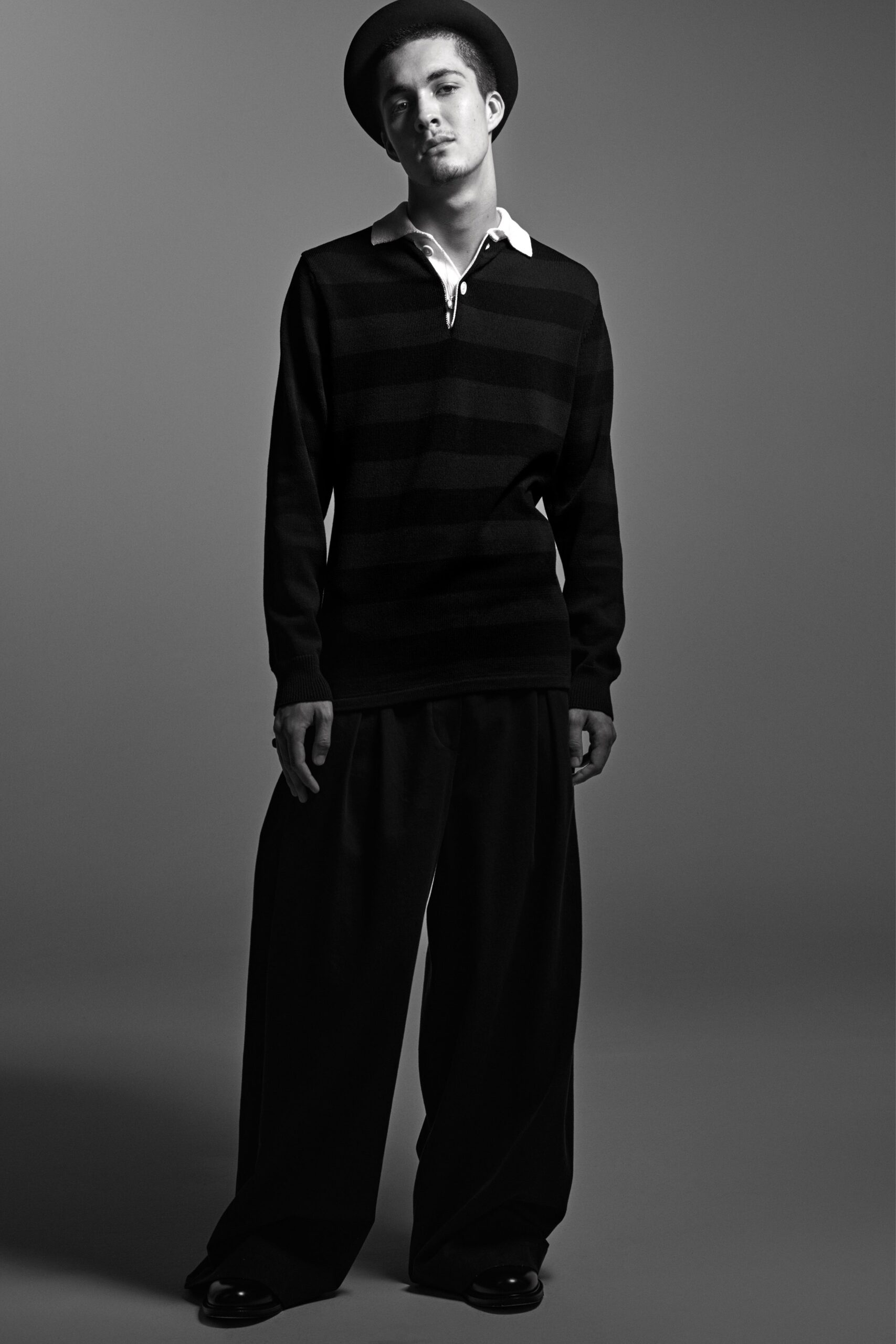 black and white striped sweater with wide-leg pants