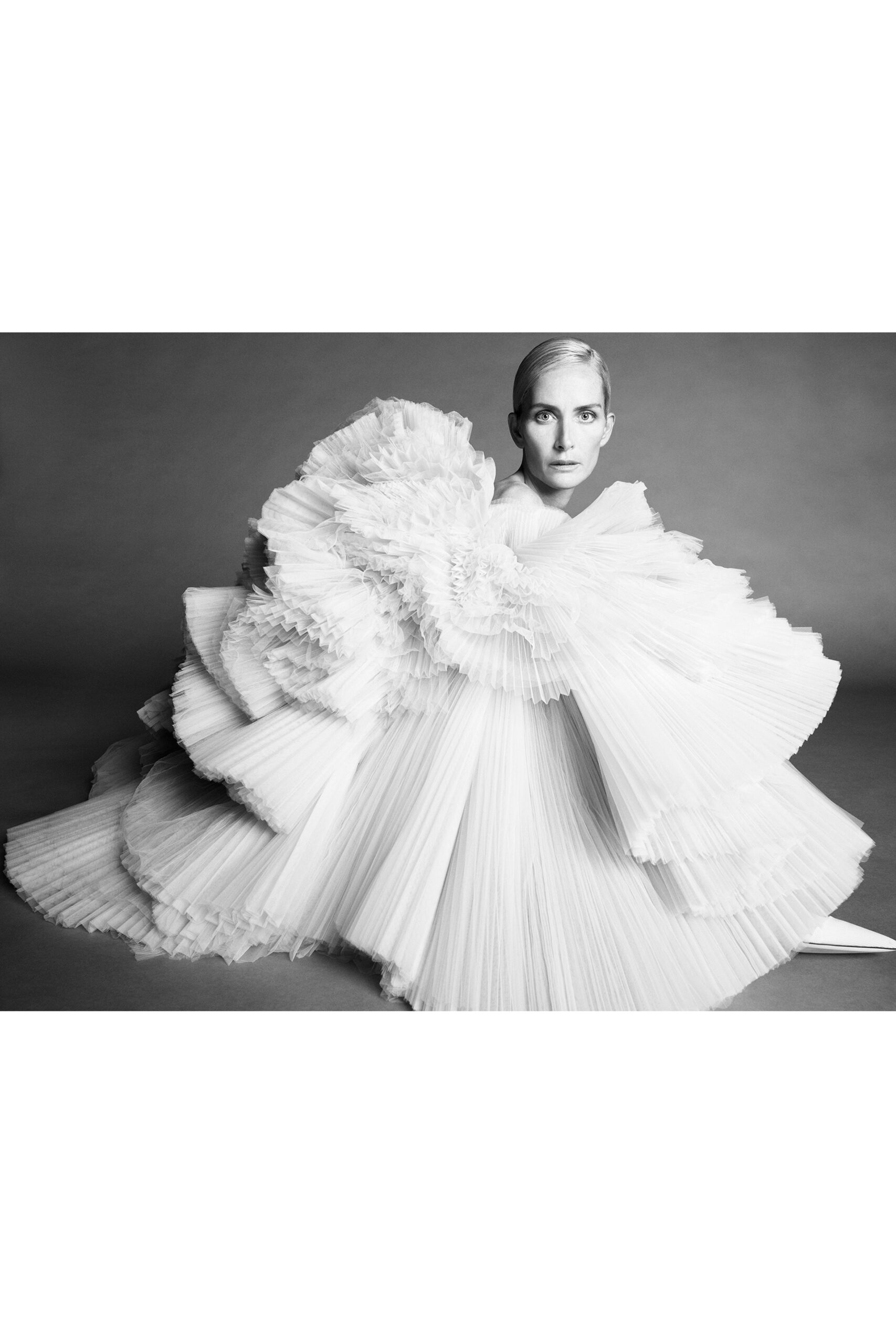 white pleated flowing dress