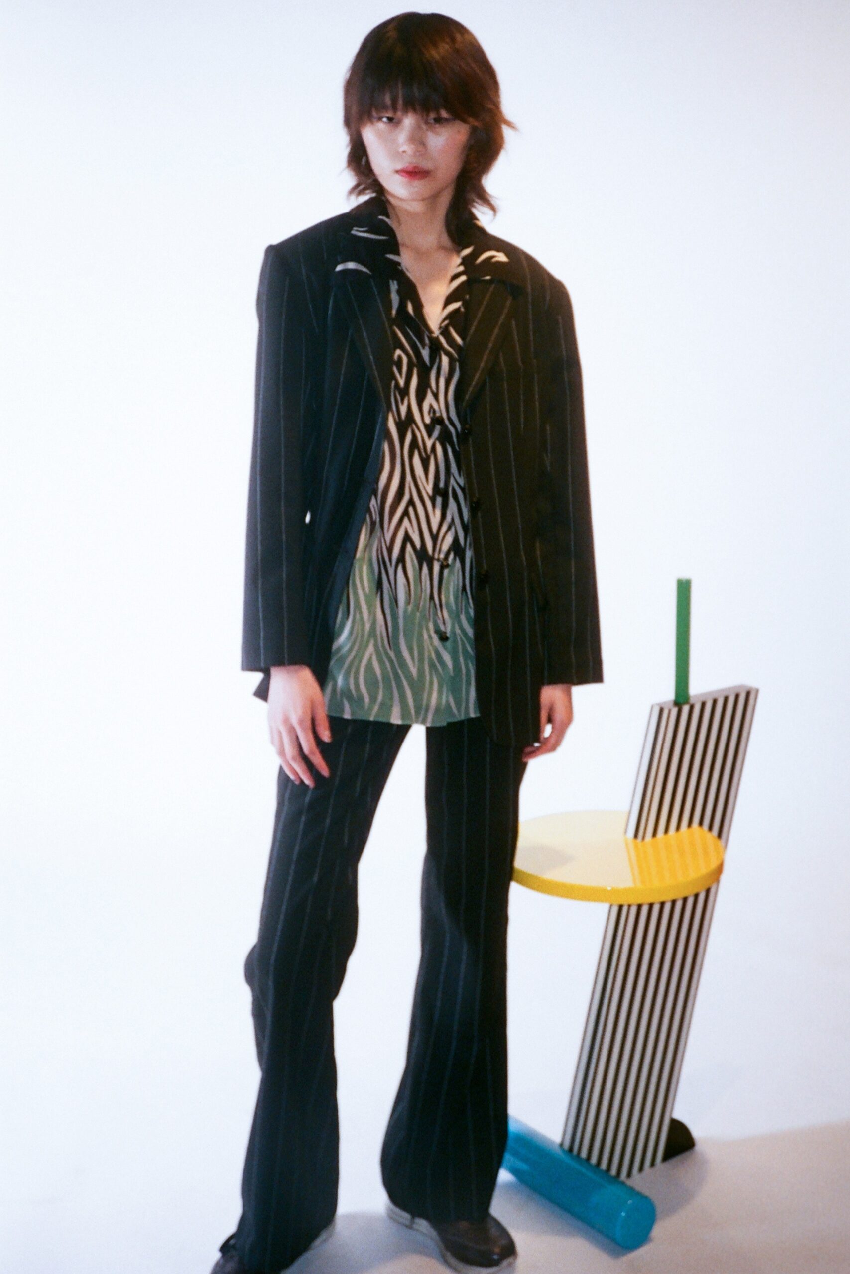 tailored black striped blazer with printed shirt