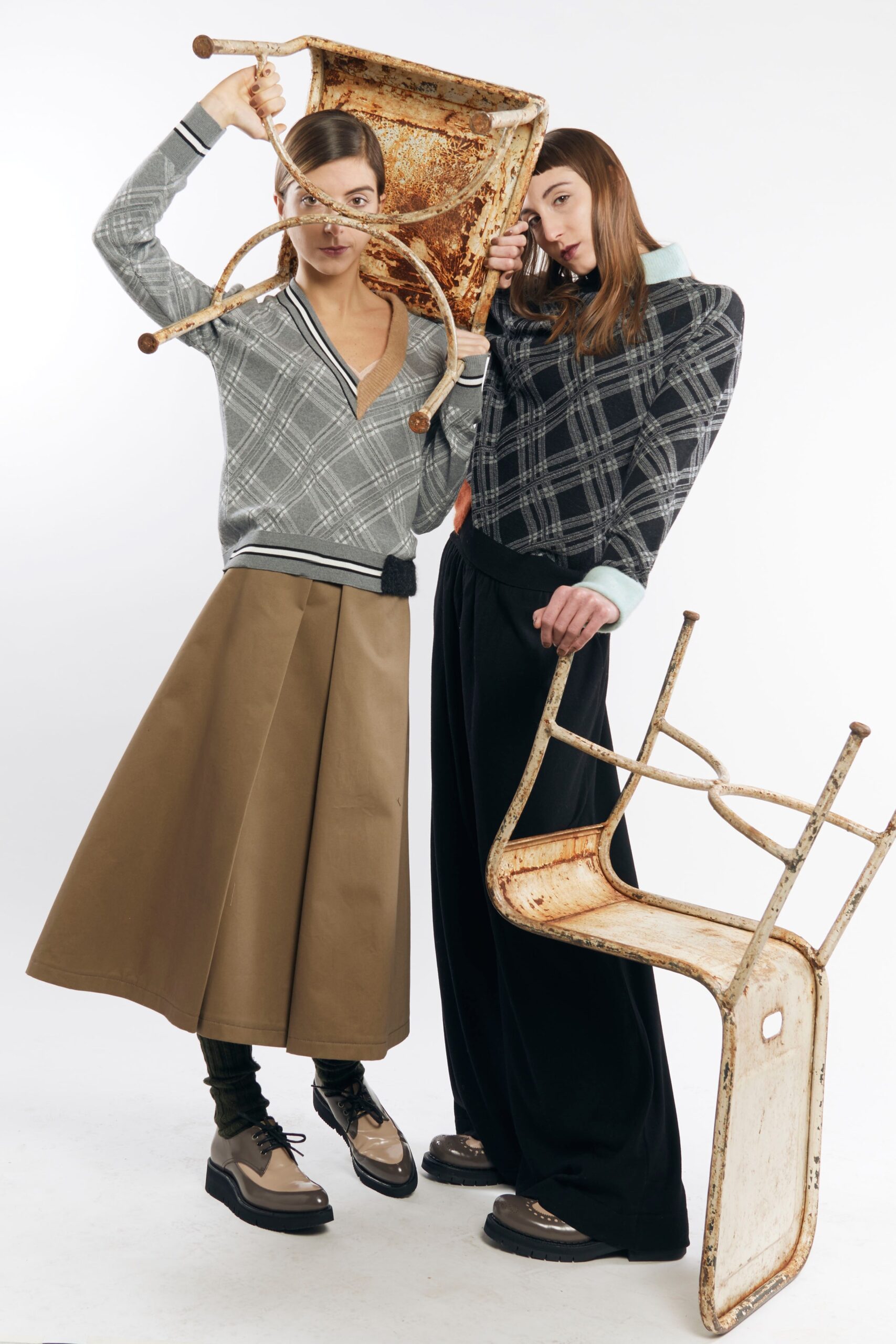 gray checked top with beige pleated skirt