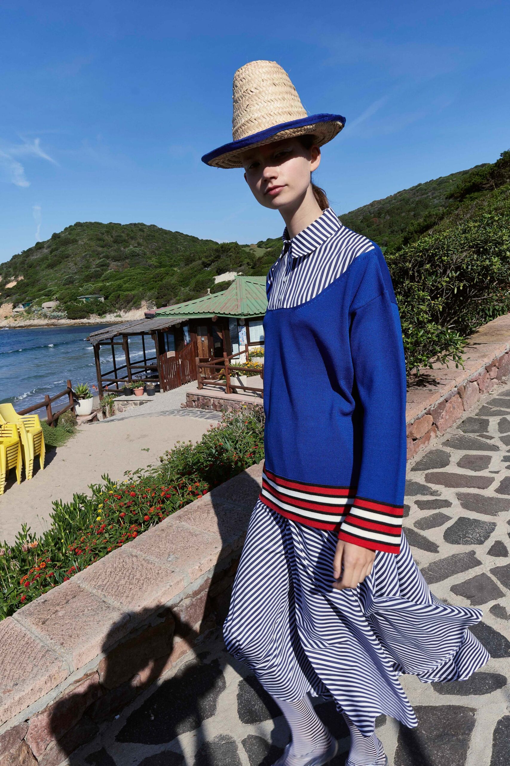blue striped top and white tiered skirt