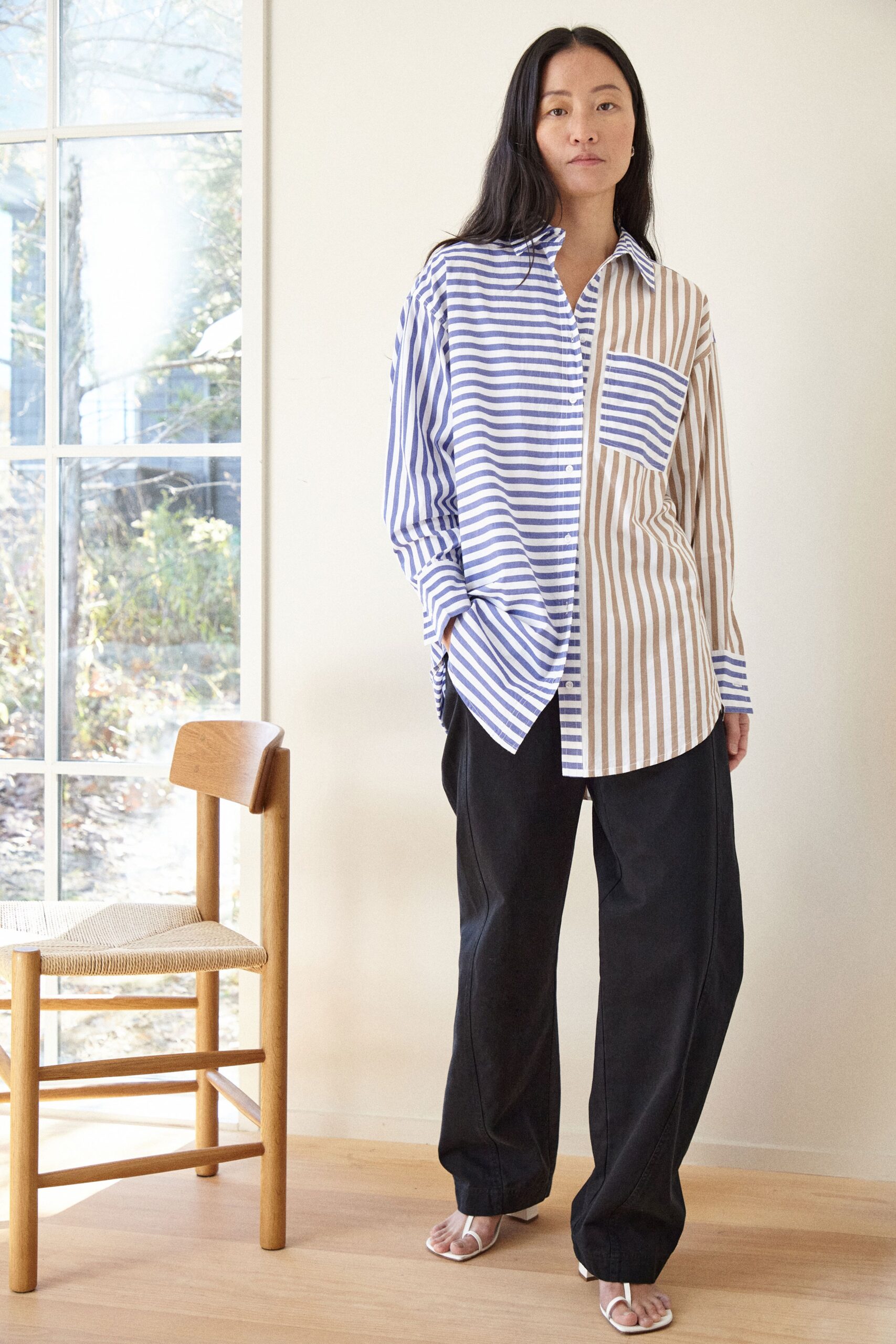 striped shirt and black pants