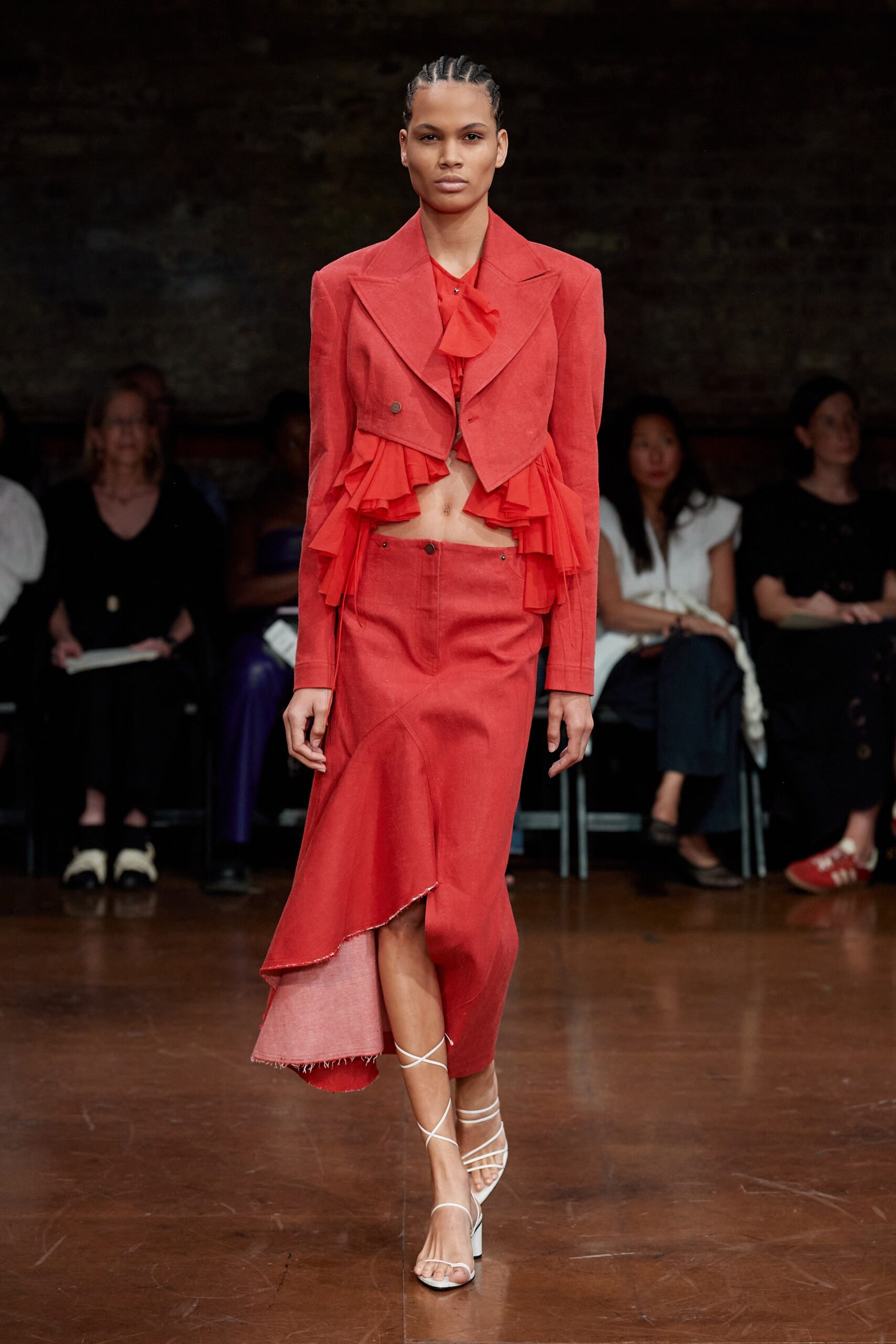 red fitted blazer and skirt