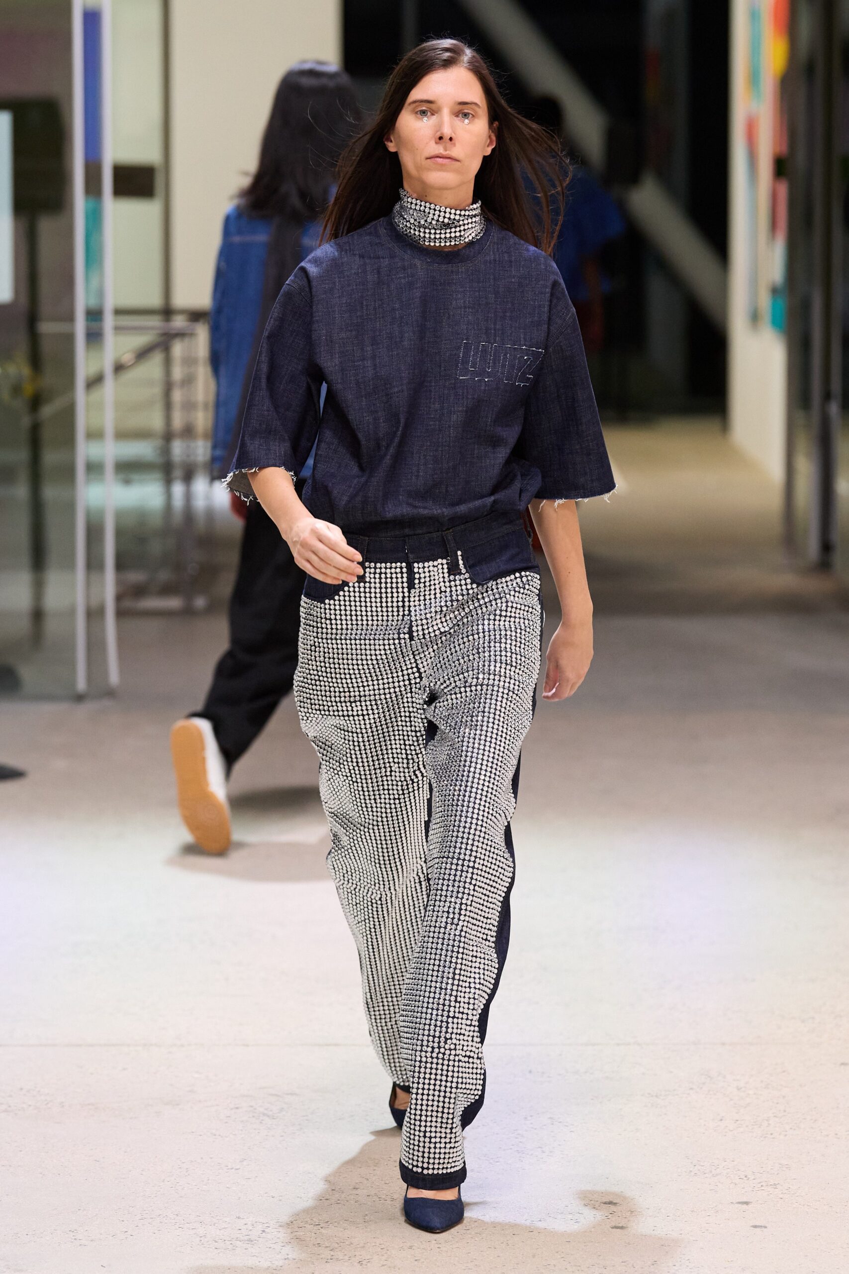 blue denim long-sleeve high-neck relaxed fringed top