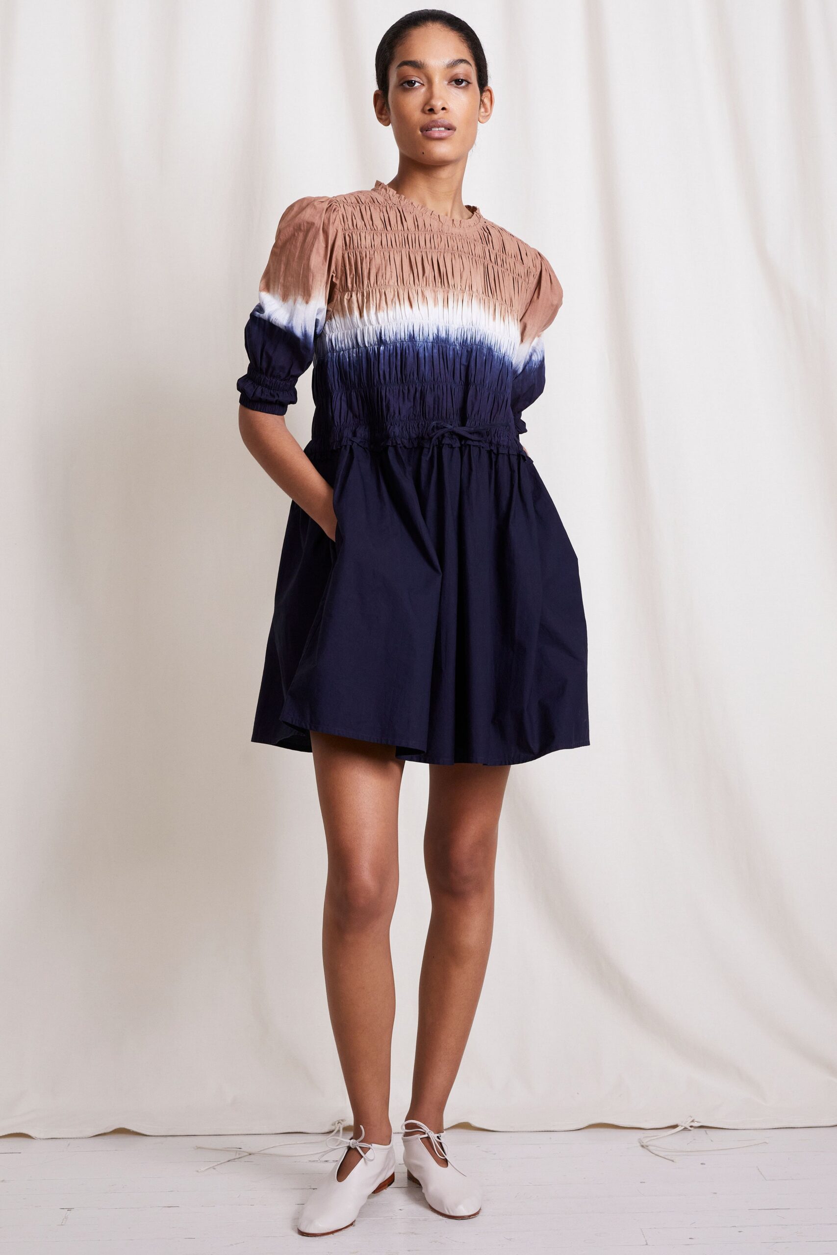 brown and blue pleated mini dress
