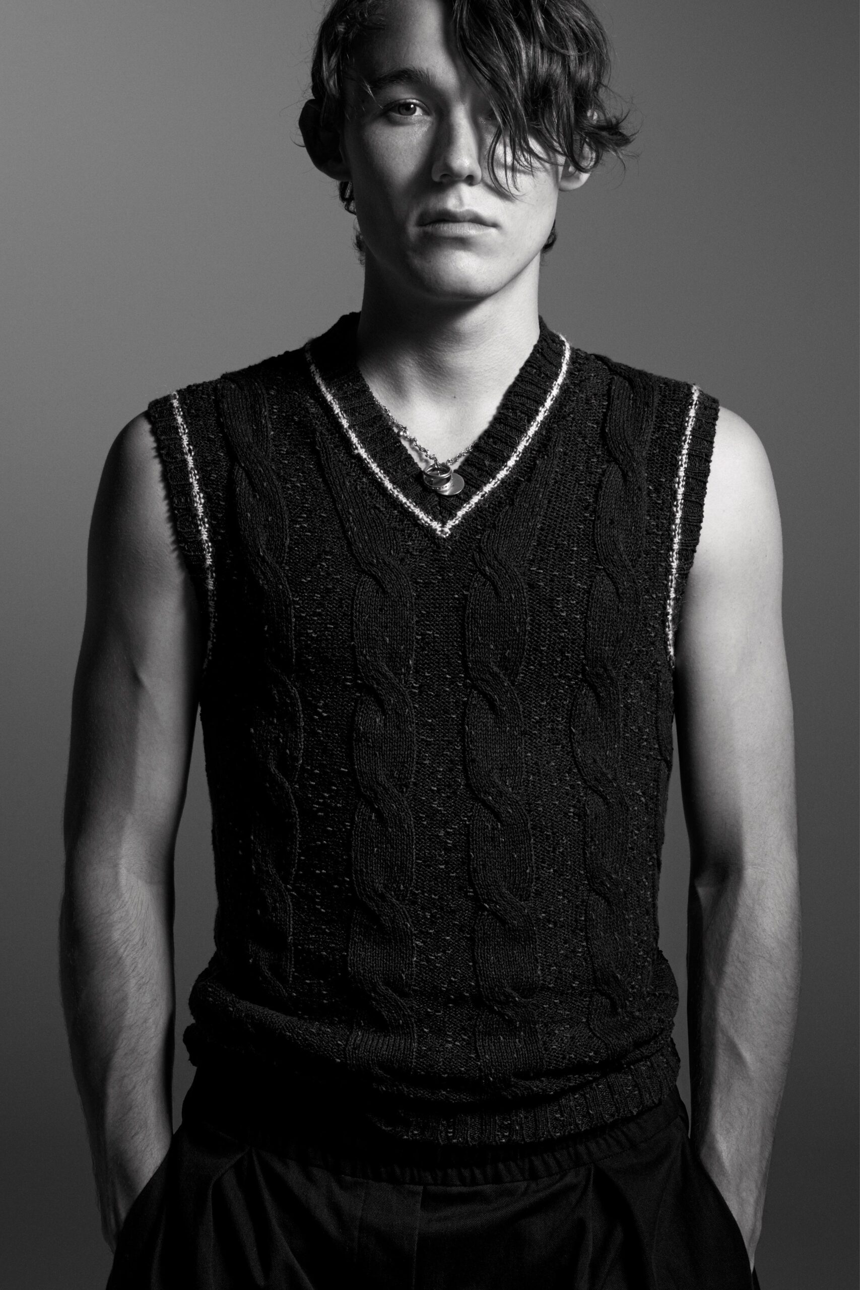 black fitted sweater and pants