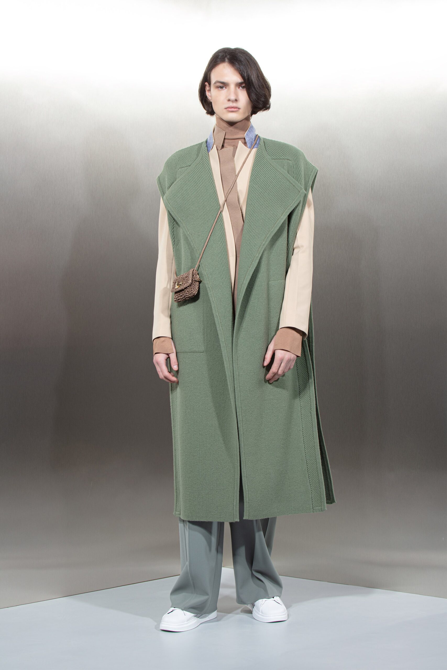 green wool coat with beige shirt