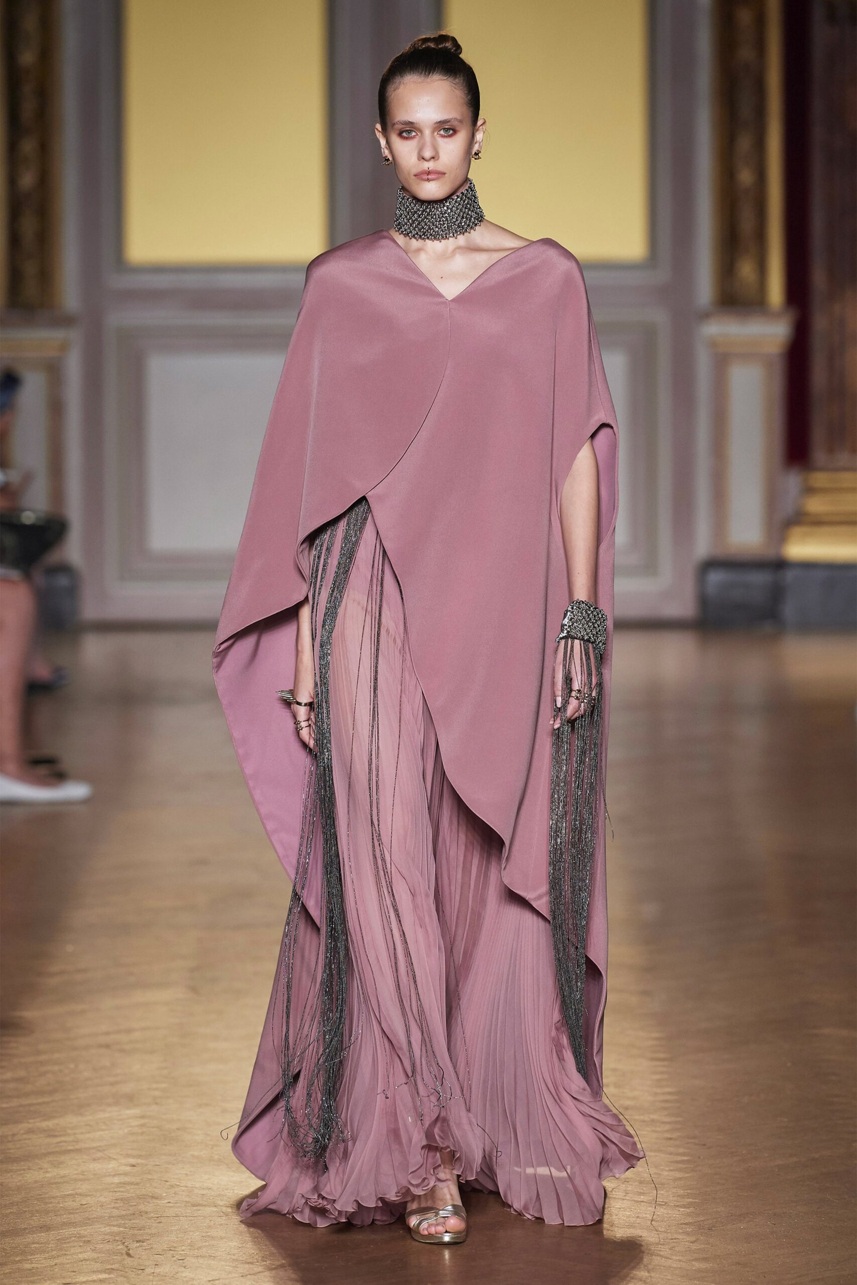 pink silk cape and pleated dress