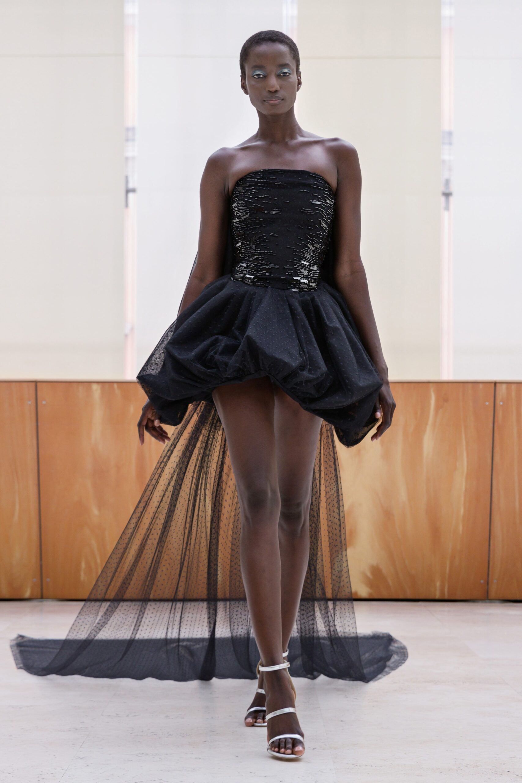 black strapless pleated dress