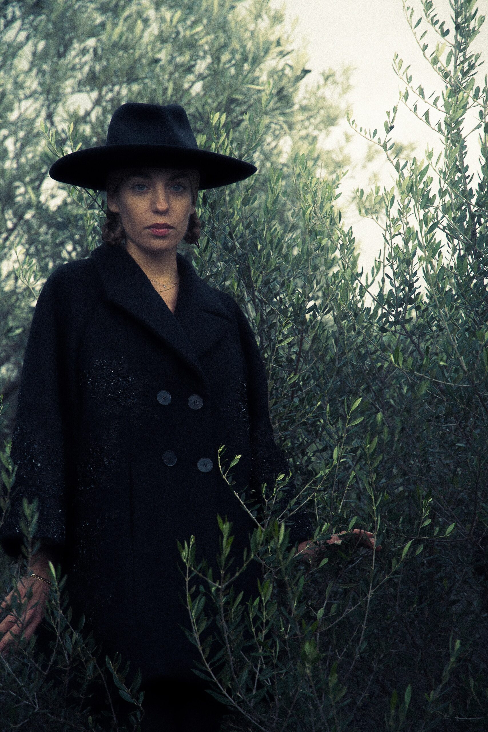 black wool long-sleeve double-breasted relaxed textured coat