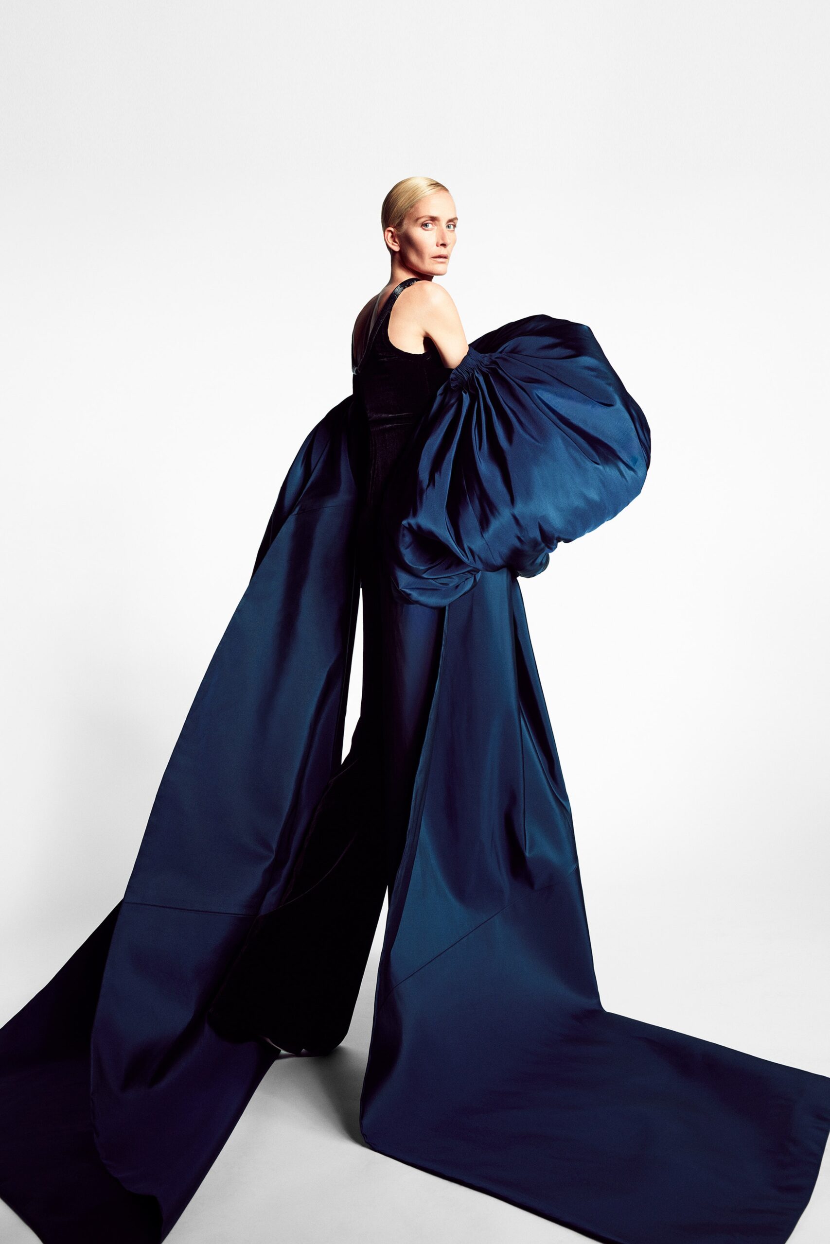 blue silk sleeveless gown