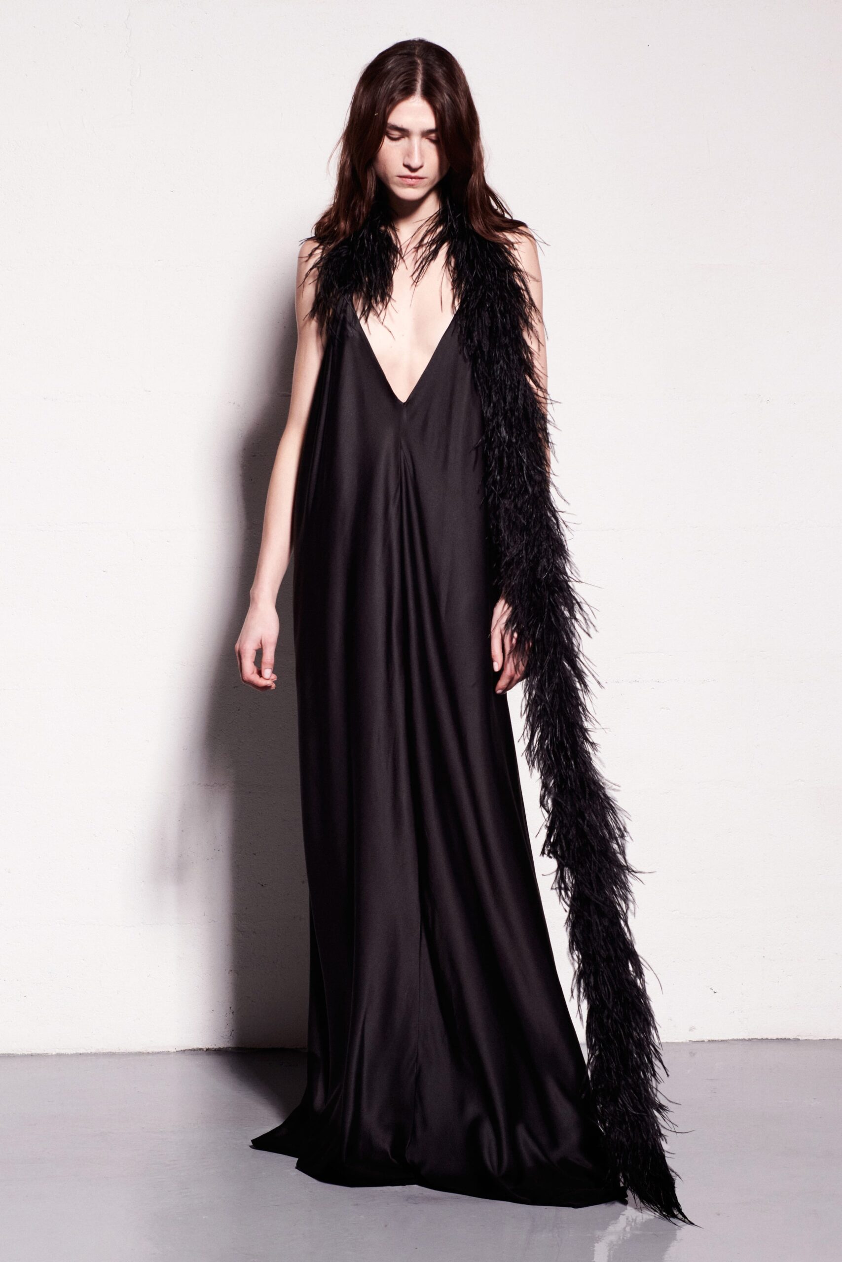black silk gown with feather cape