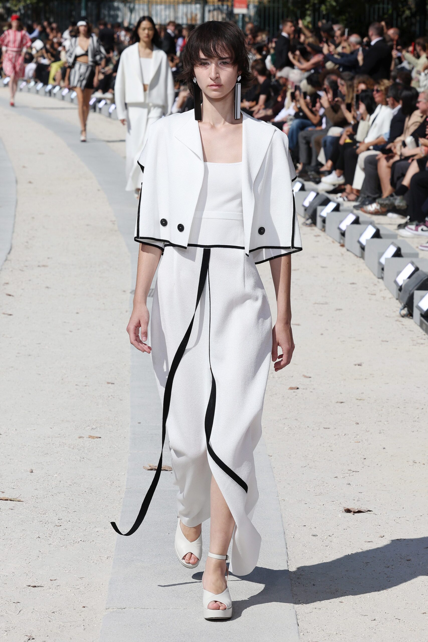 white cotton short-sleeve collared structured buttoned jacket