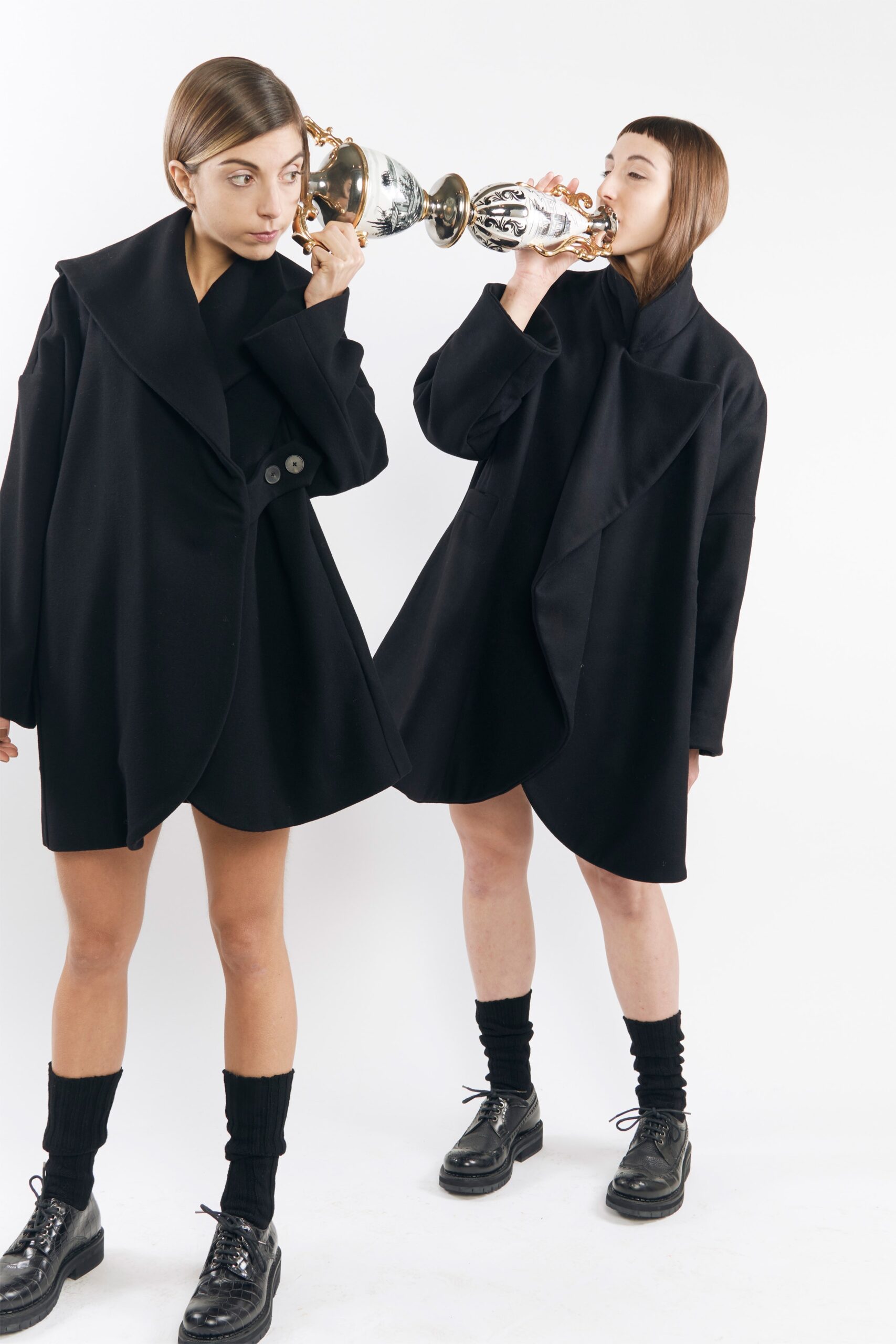 black wool long-sleeve collared oversized buttoned short coat