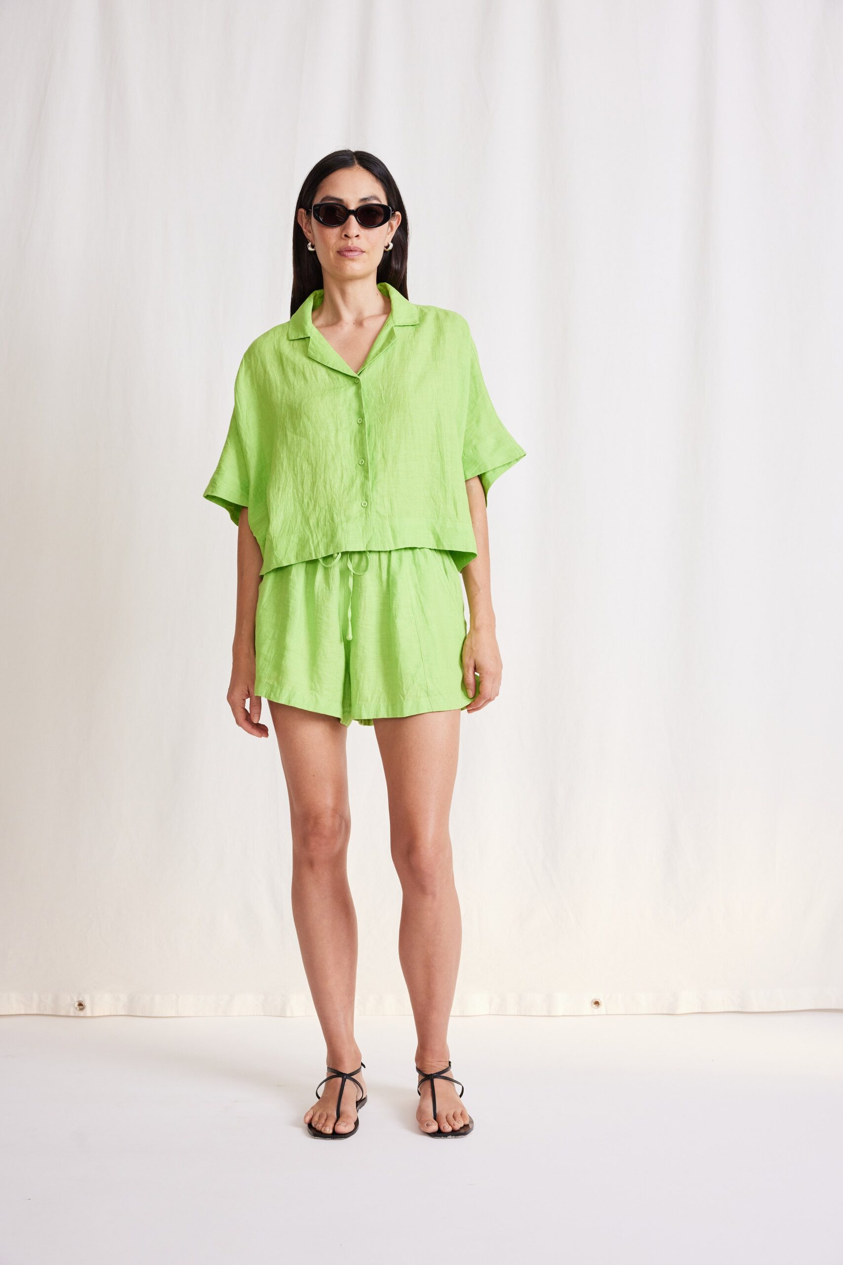 green relaxed top and shorts
