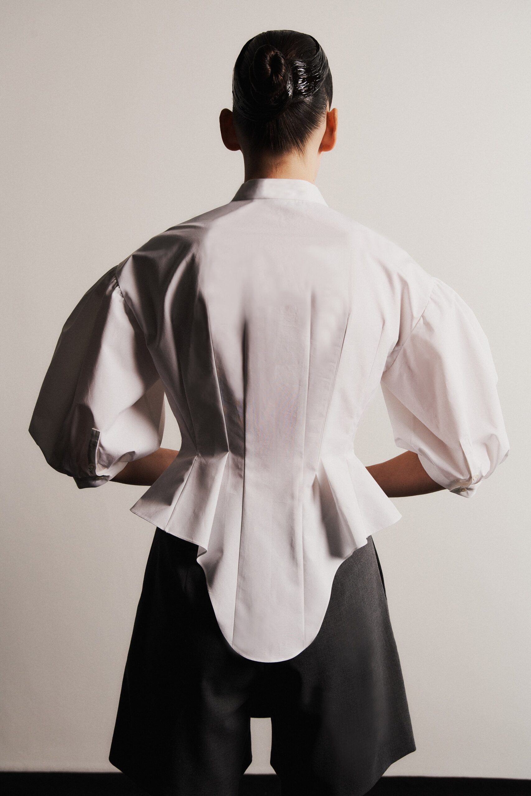 white fitted blouse with black skirt