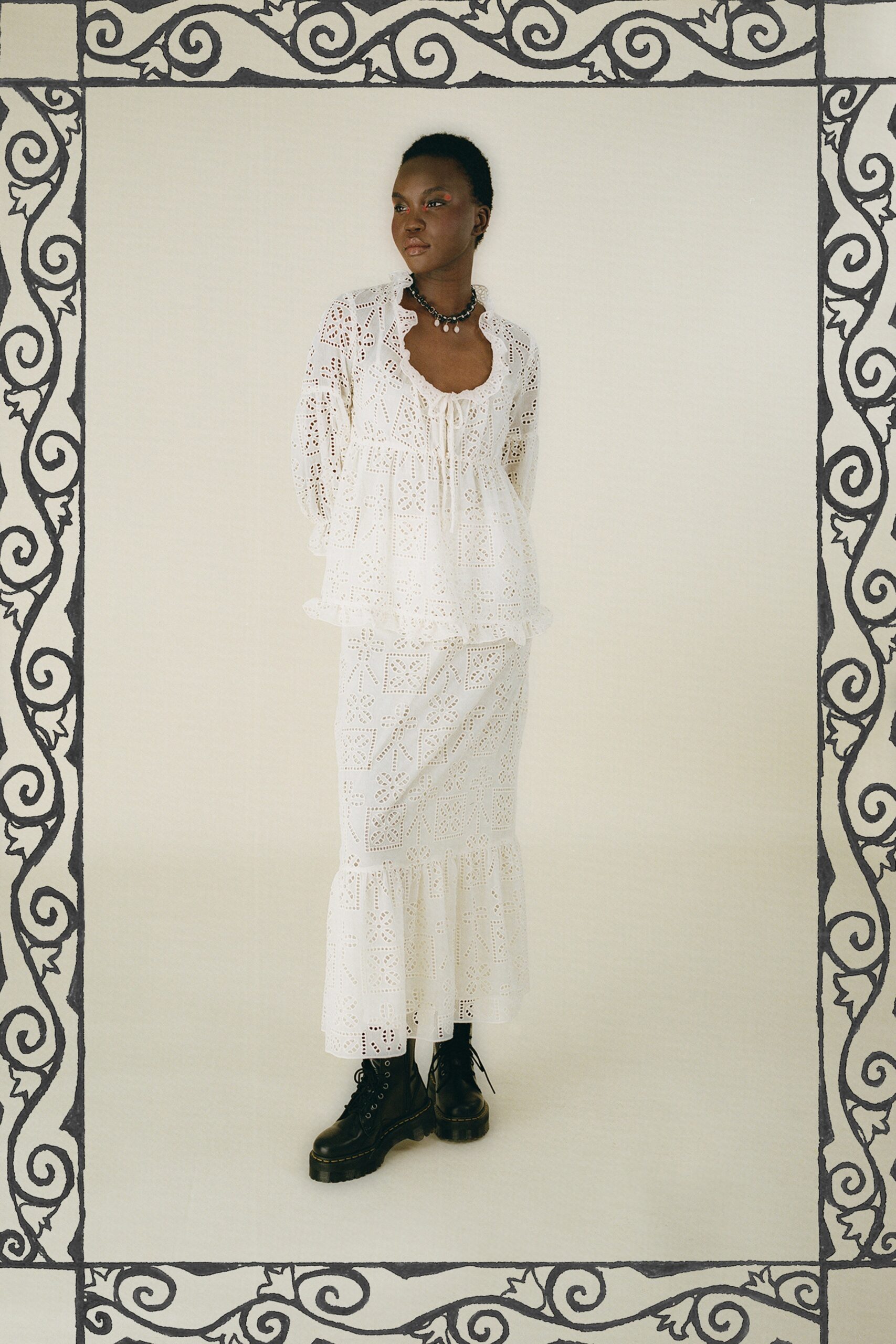 white lace long-sleeve v-neck relaxed ruffled top