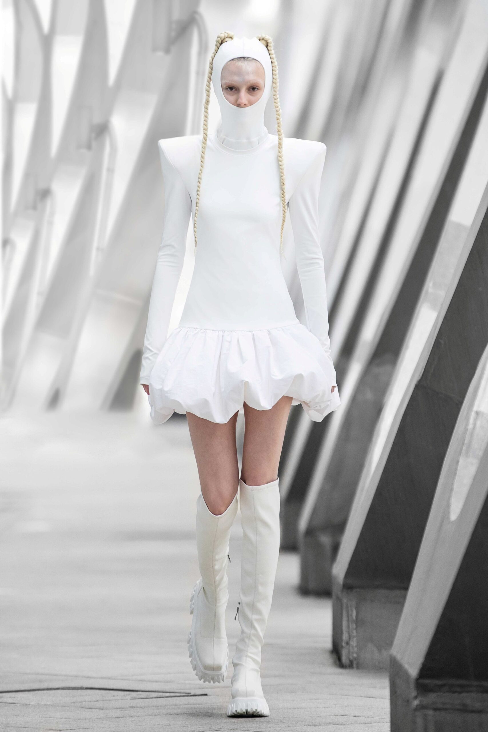 white fitted mini dress with boots