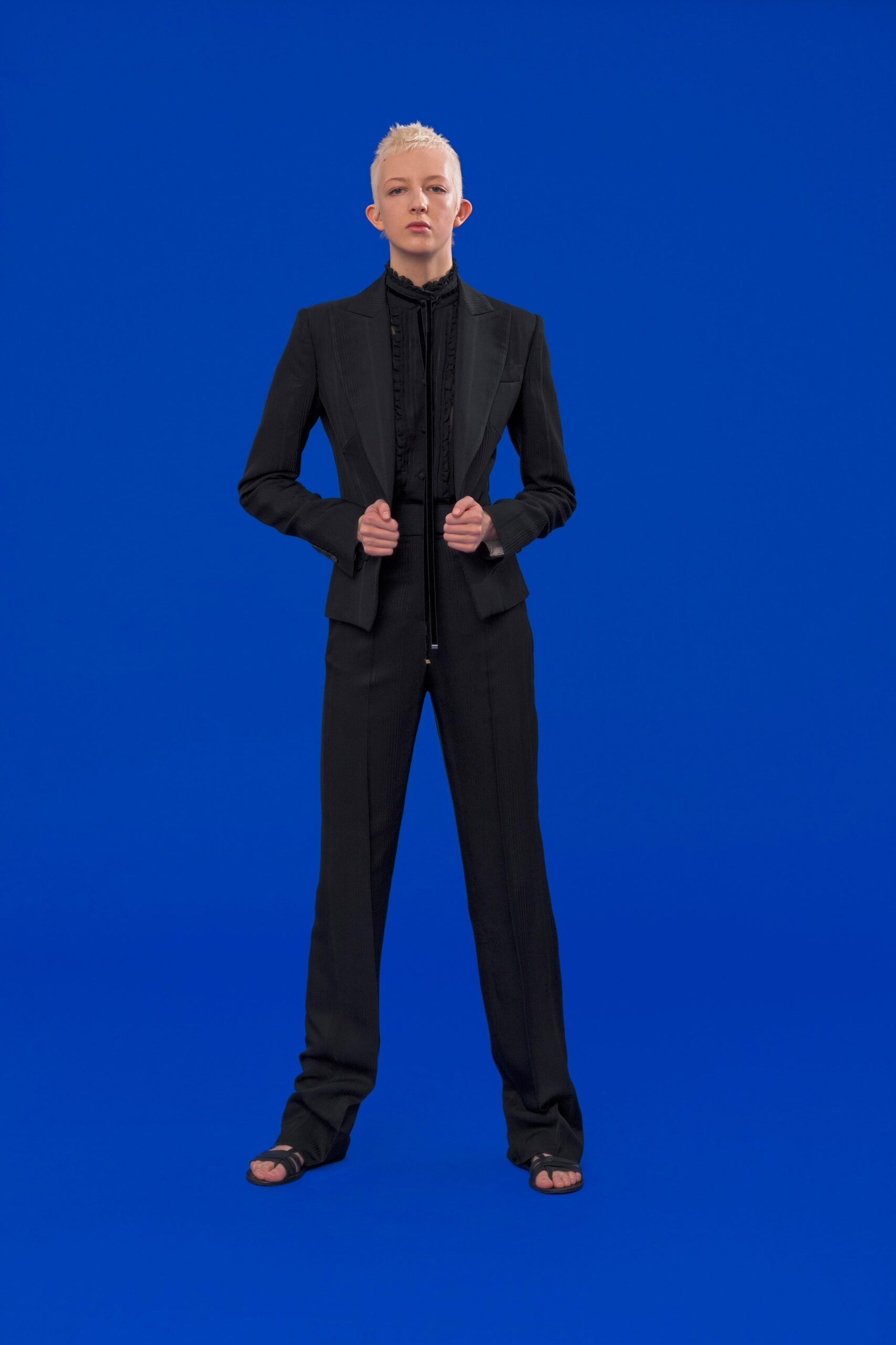 black tailored suit with open-toe shoes