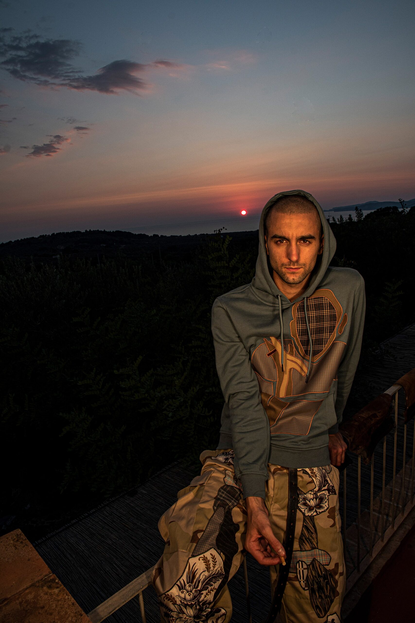 gray hoodie and cargo pants