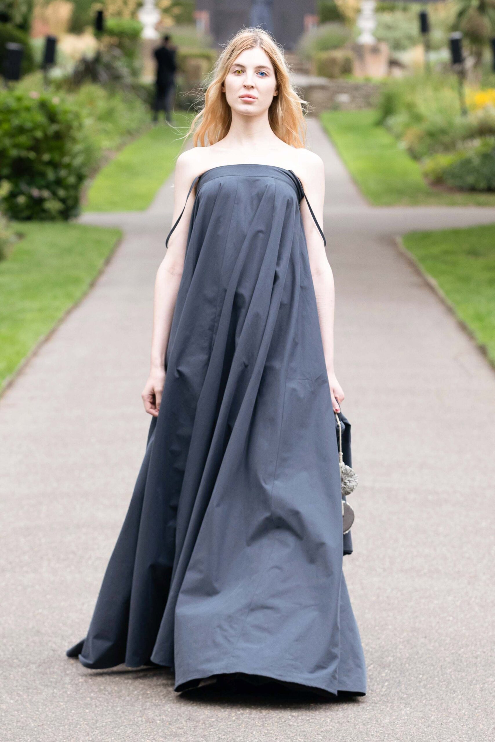 gray draped sleeveless gown