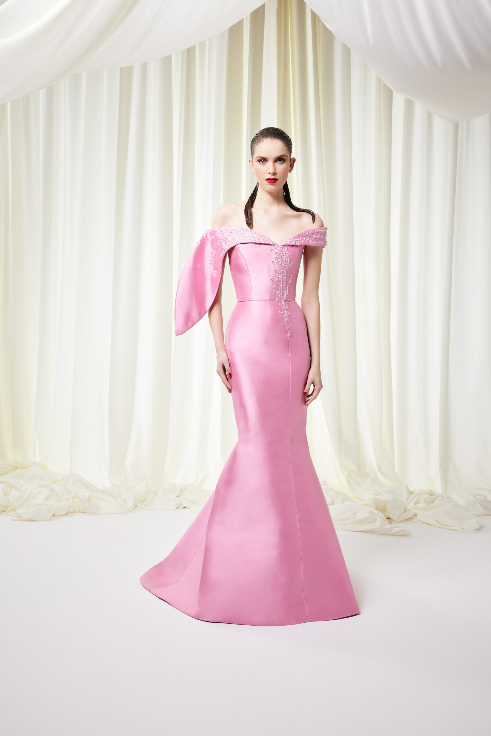 fitted pink silk off-shoulder gown
