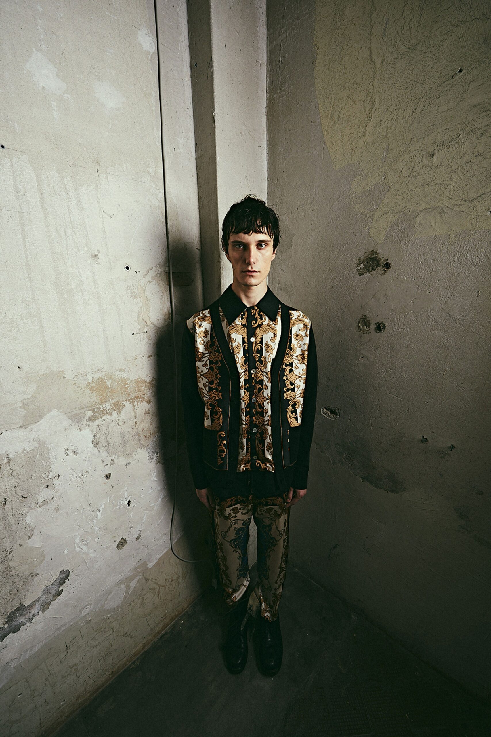 black and gold printed shirt and pants