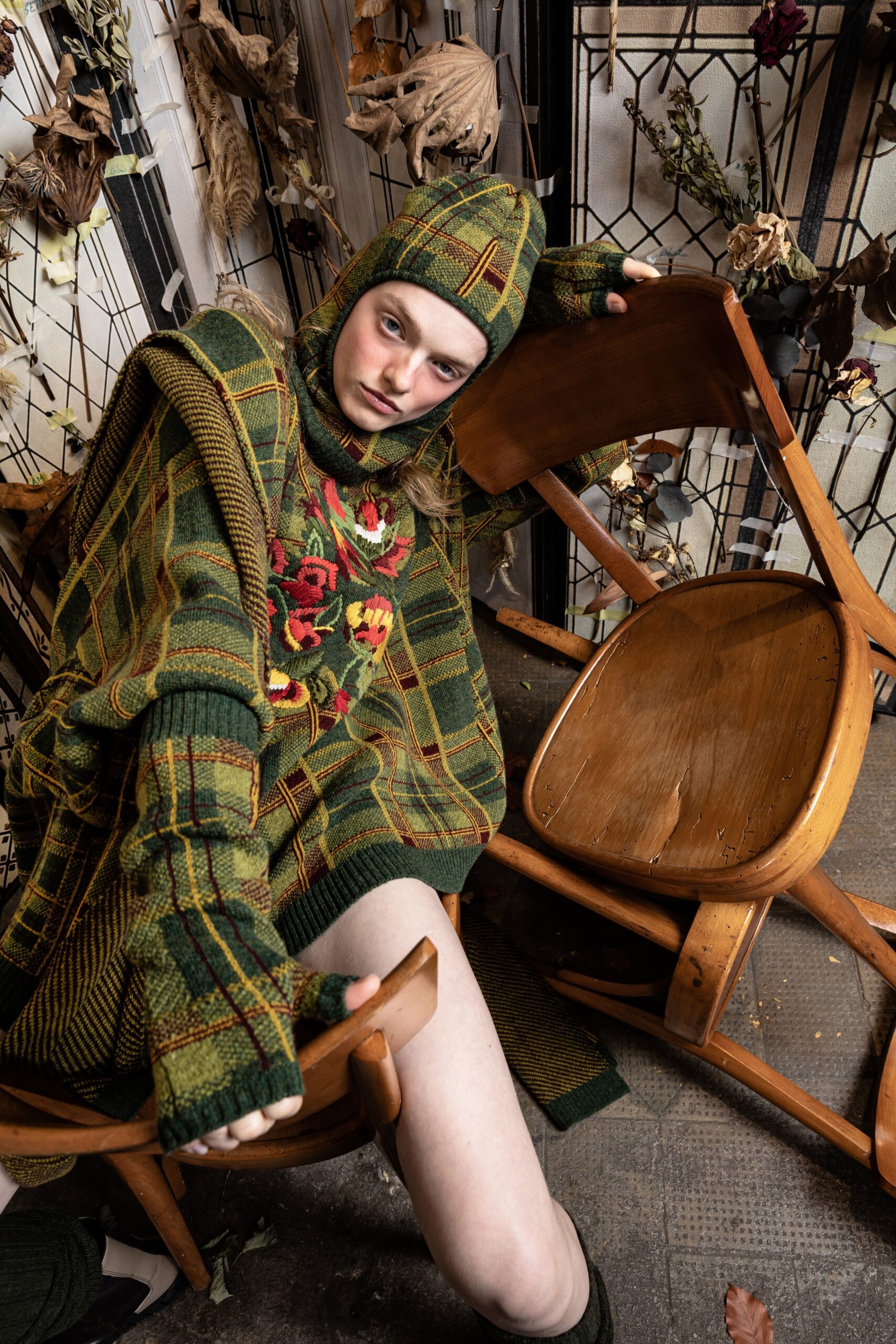 oversized green wool poncho and fitted dress