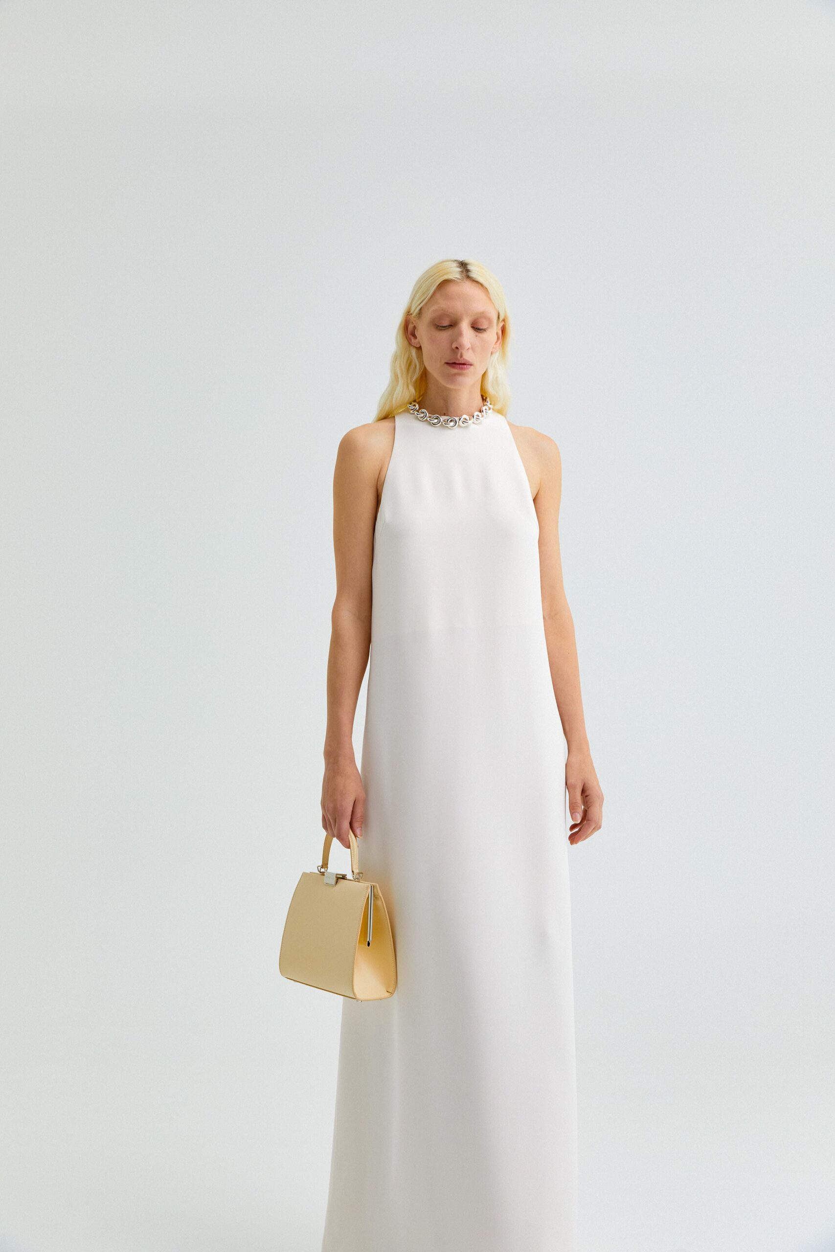 white silk sleeveless gown