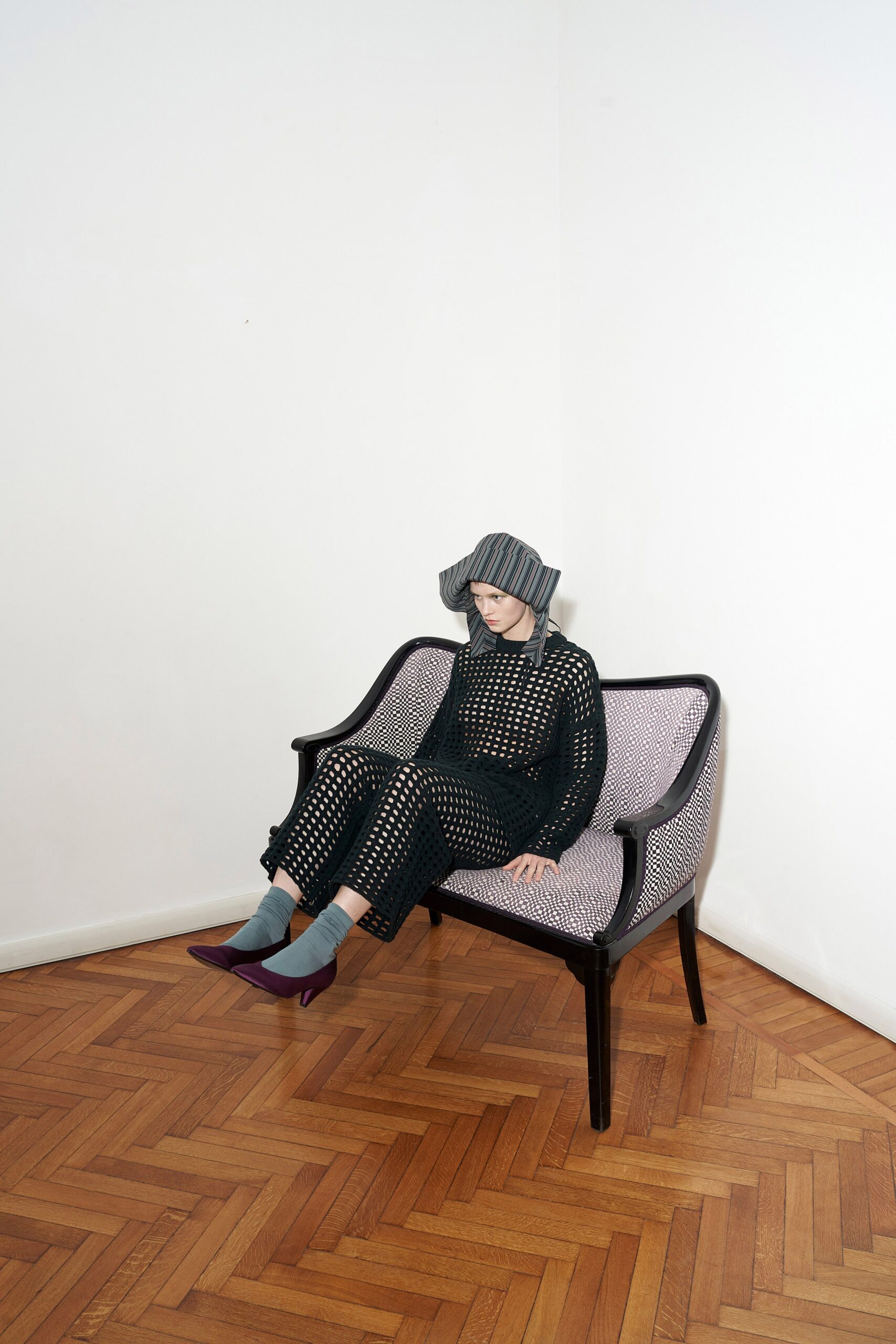 black fitted jumpsuit with hat