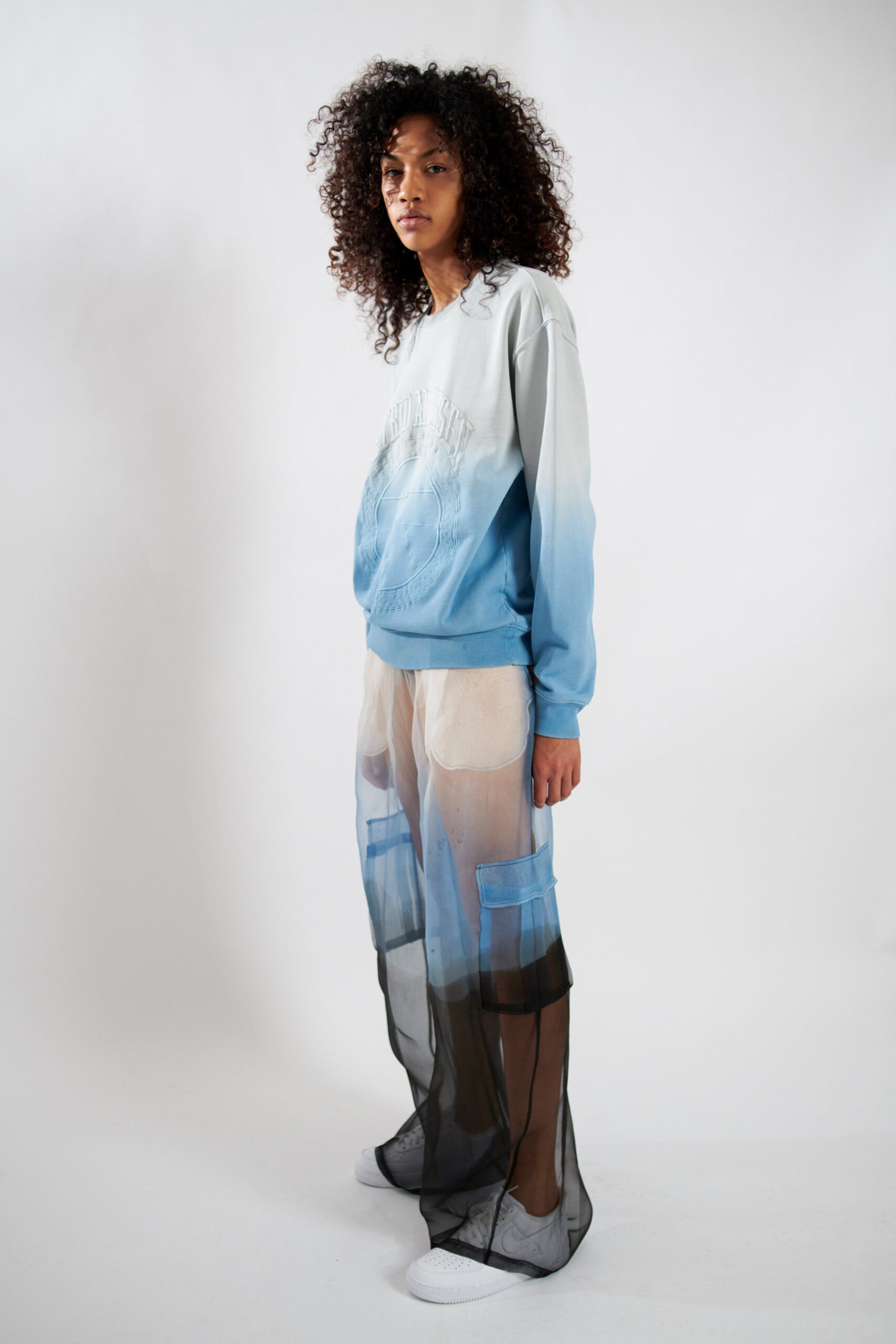 blue ombre sweater and sheer pants