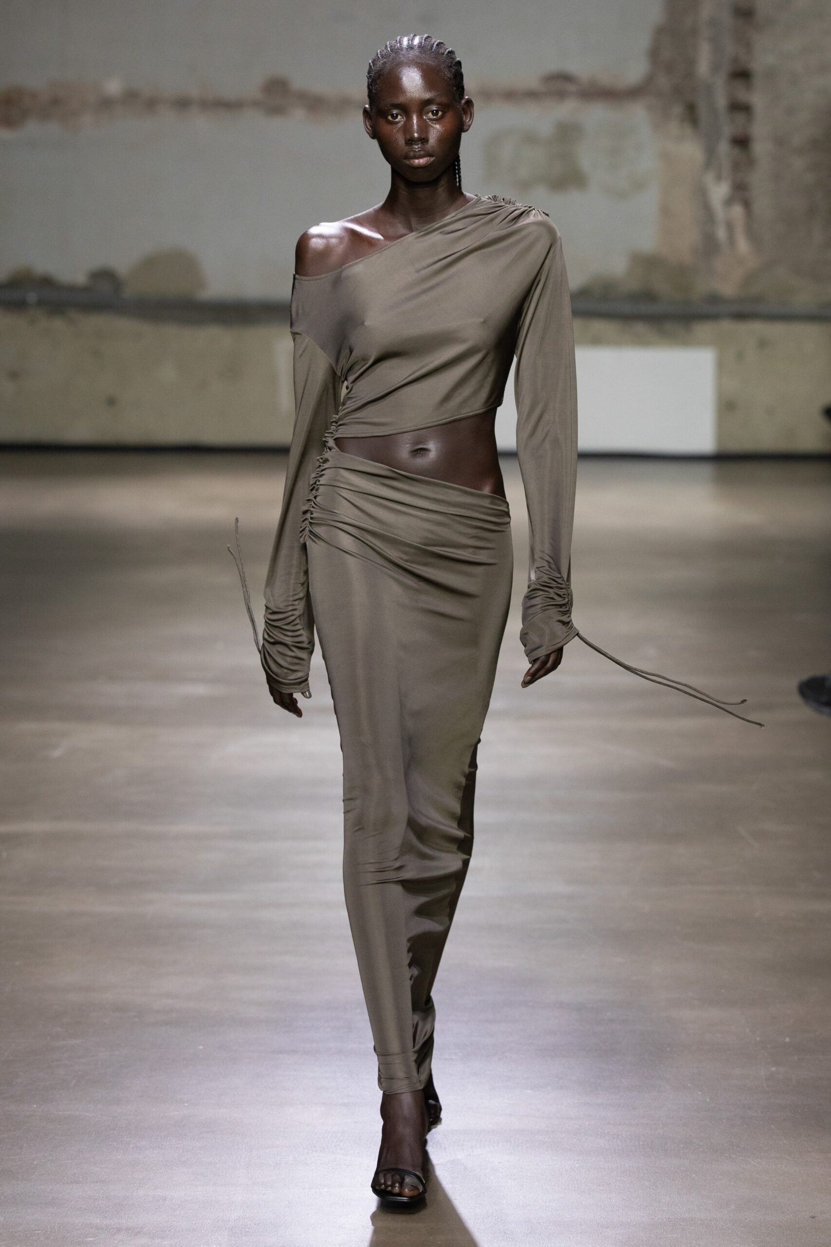 fitted green asymmetric top and pants