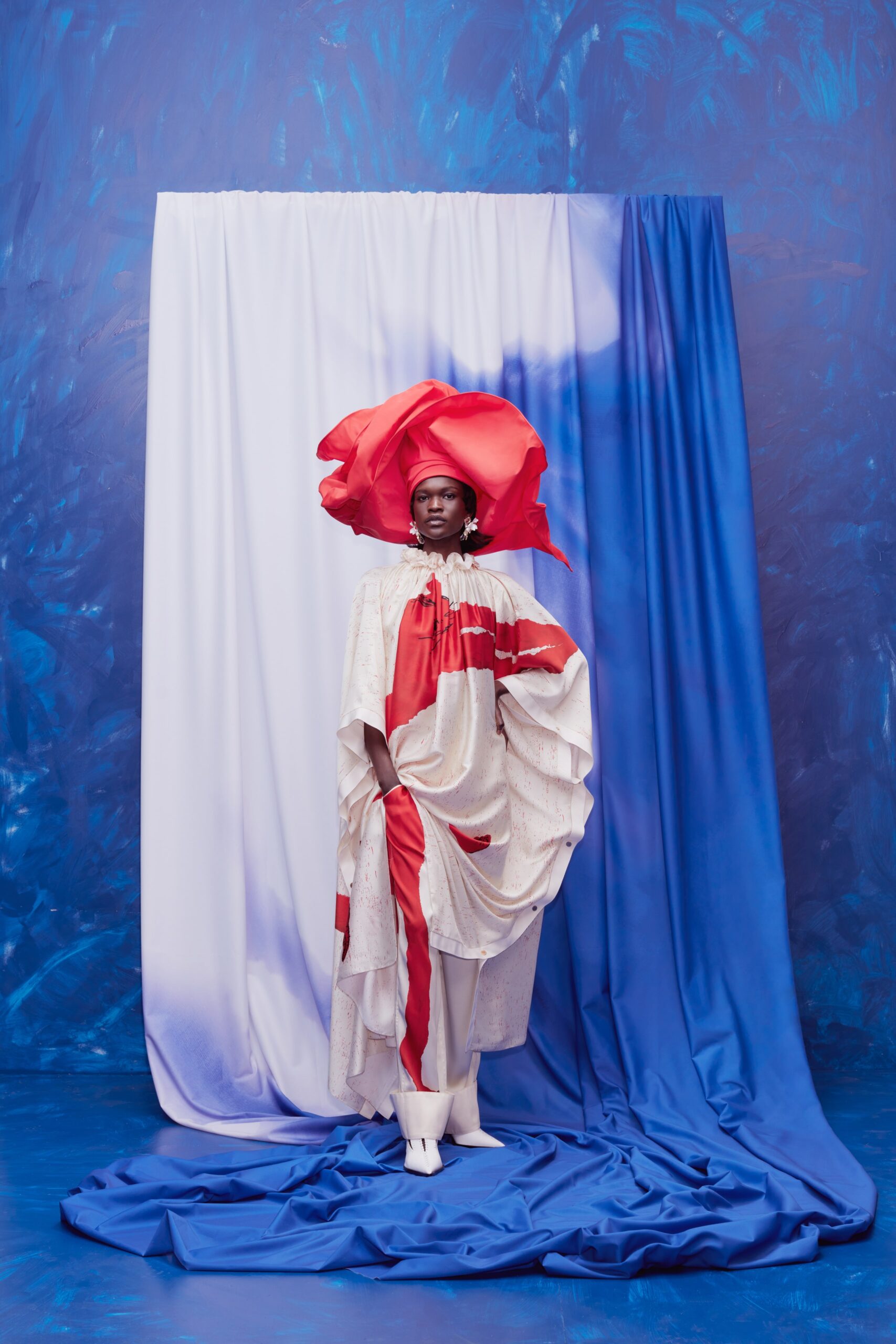 relaxed white and red maxi dress with flared hat