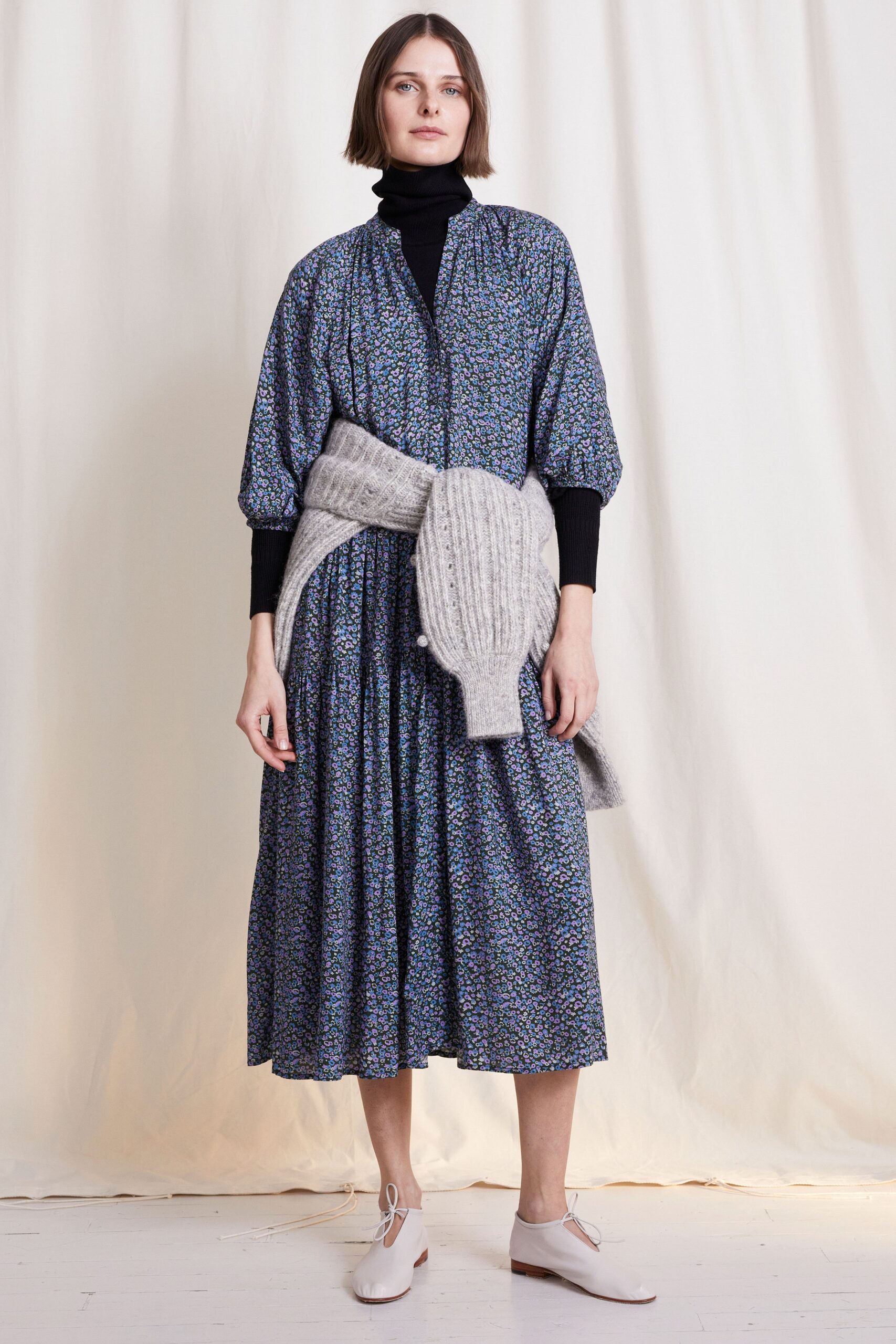 blue and purple pleated midi dress with gray sweater