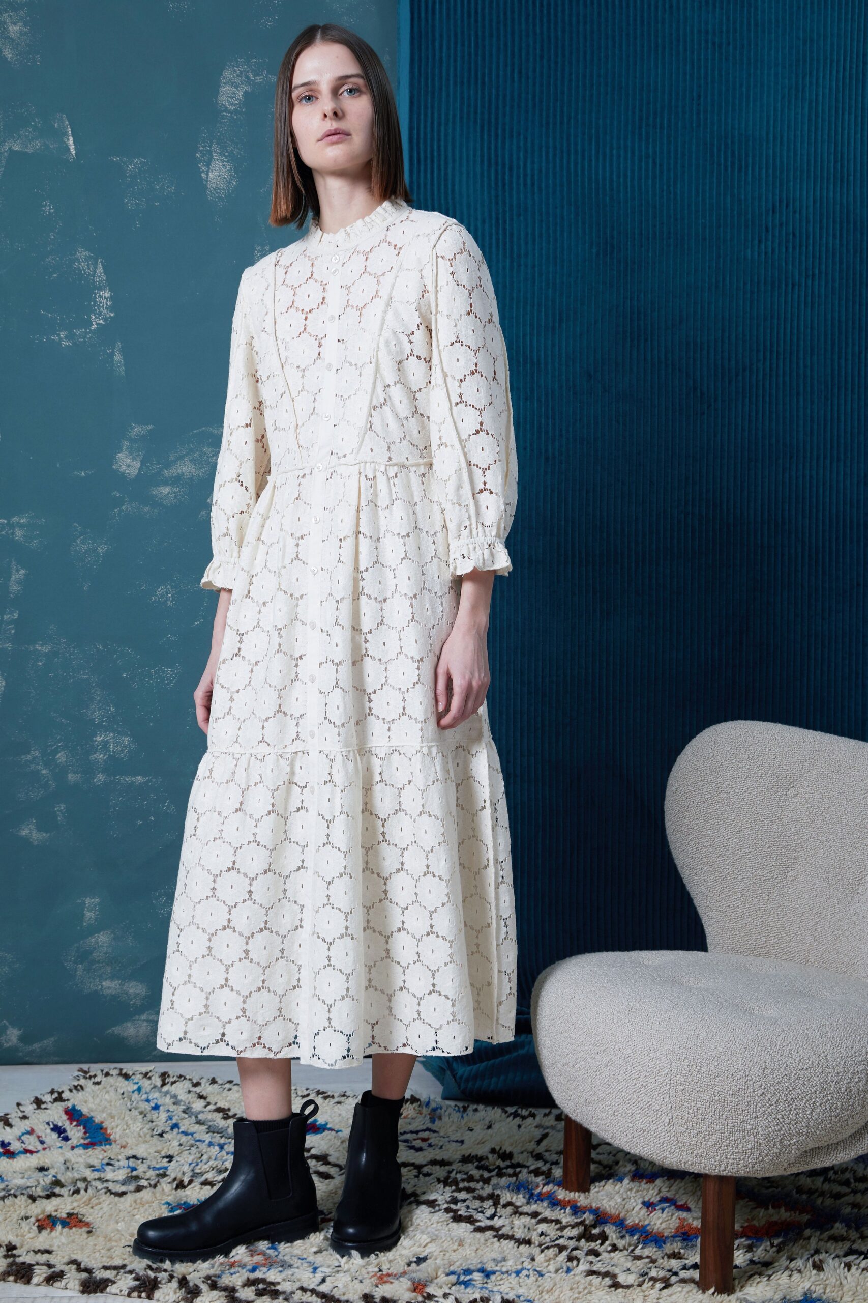 white embroidered midi dress with black boots