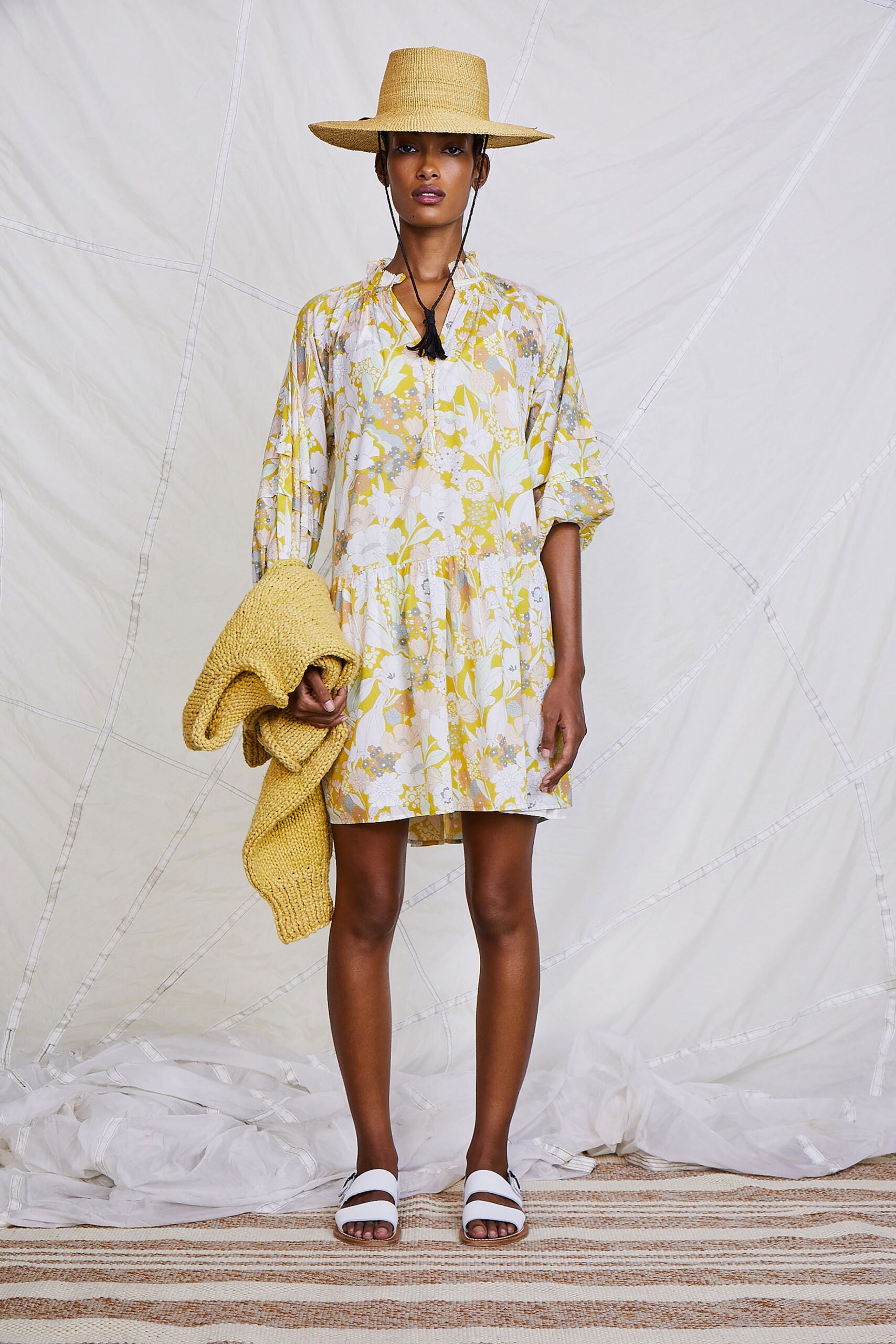 yellow floral mini dress with accessories