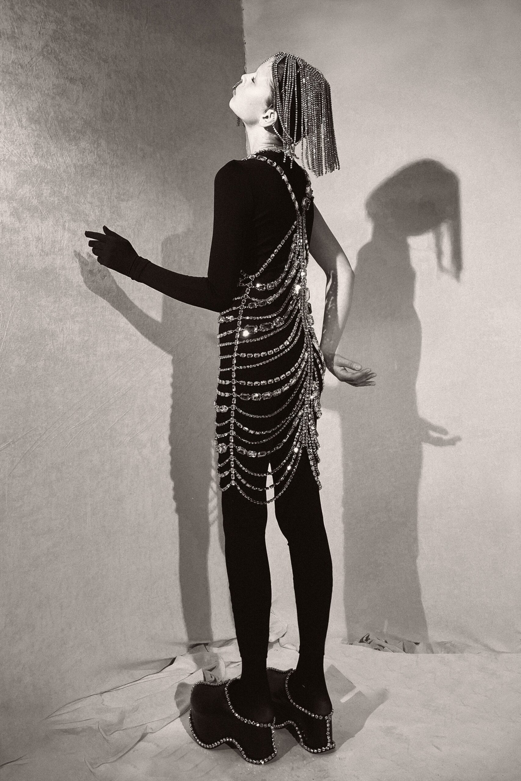 black fitted mini dress with beads