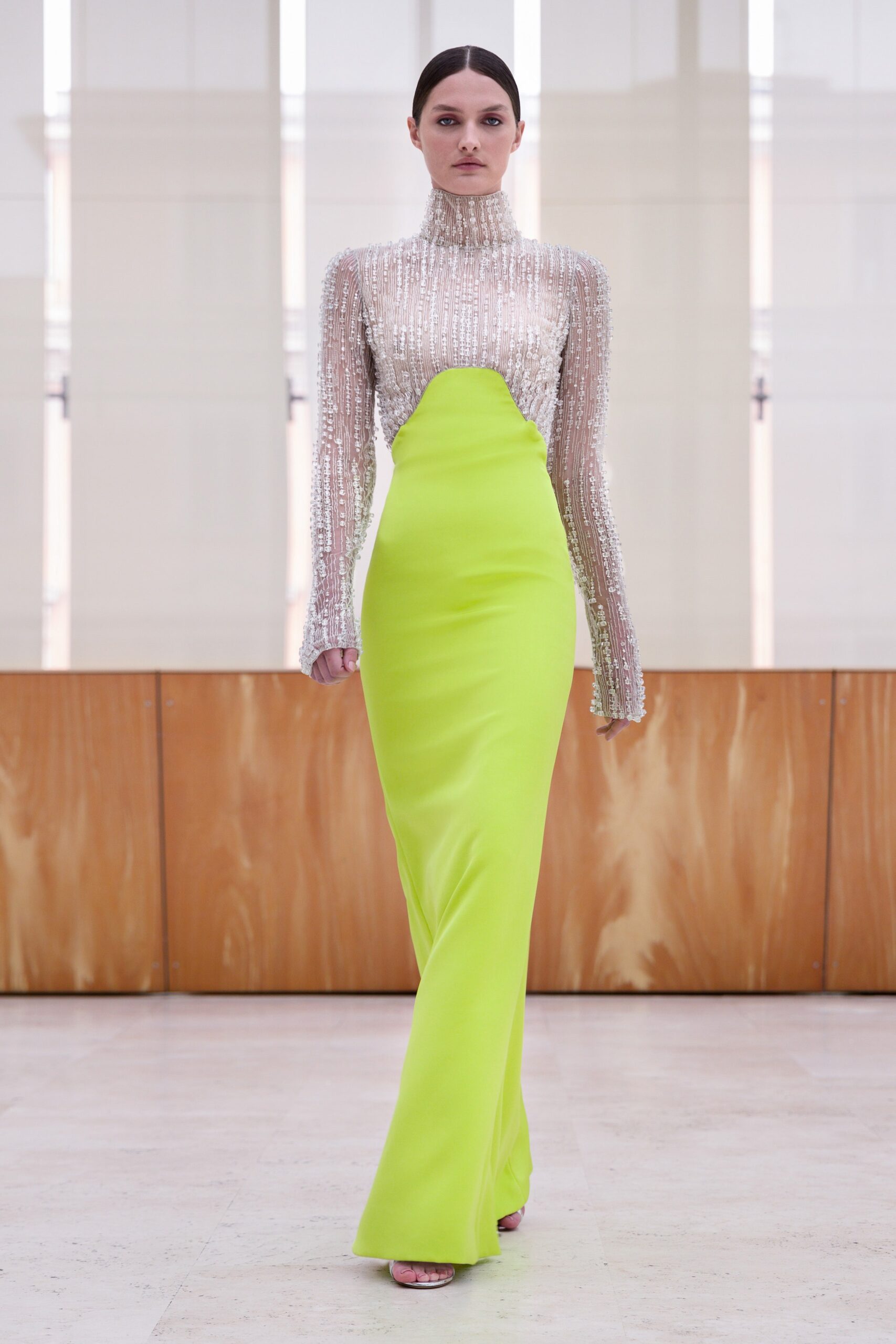 neon green fitted gown with embellished blouse