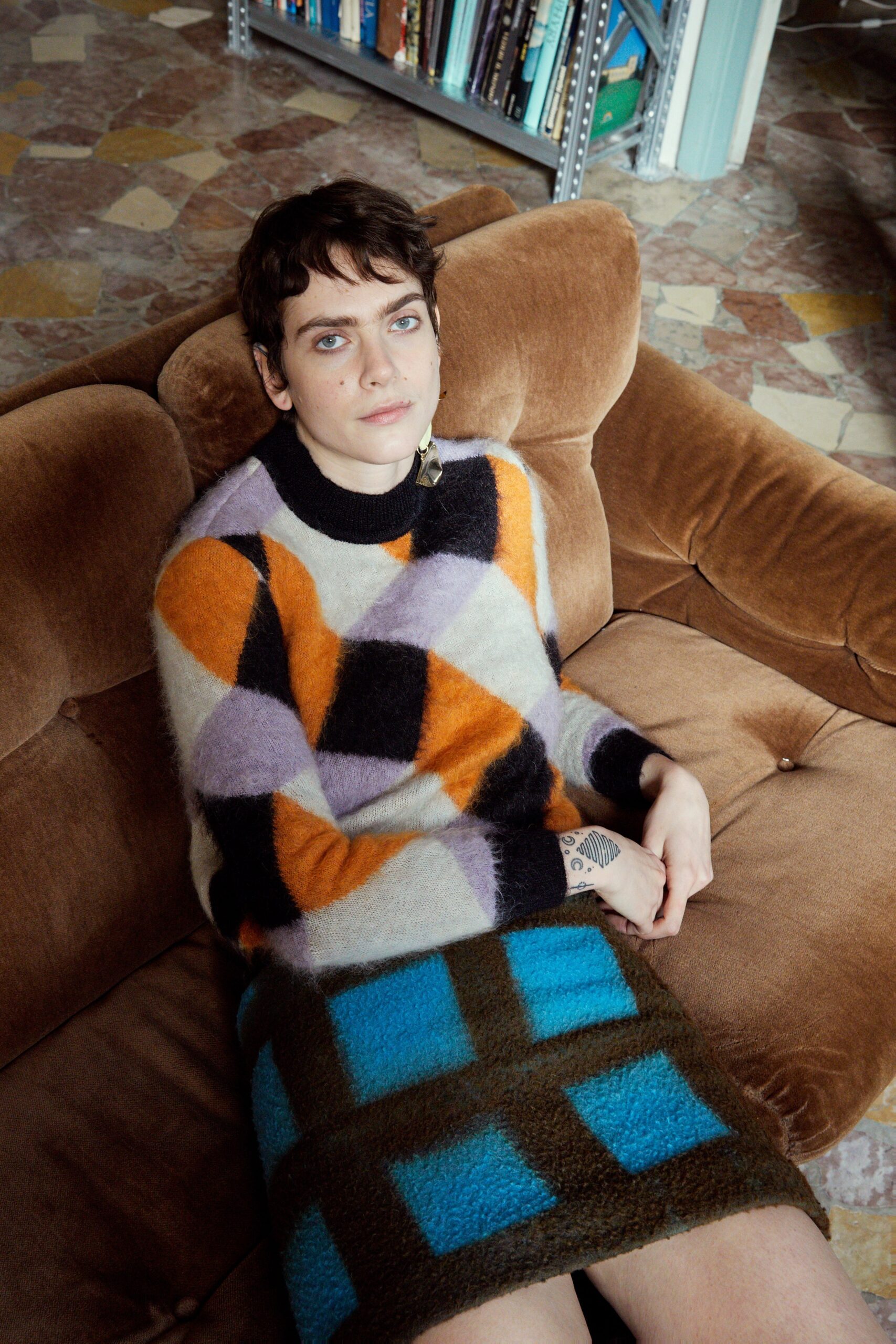 color-blocked wool sweater and mini skirt