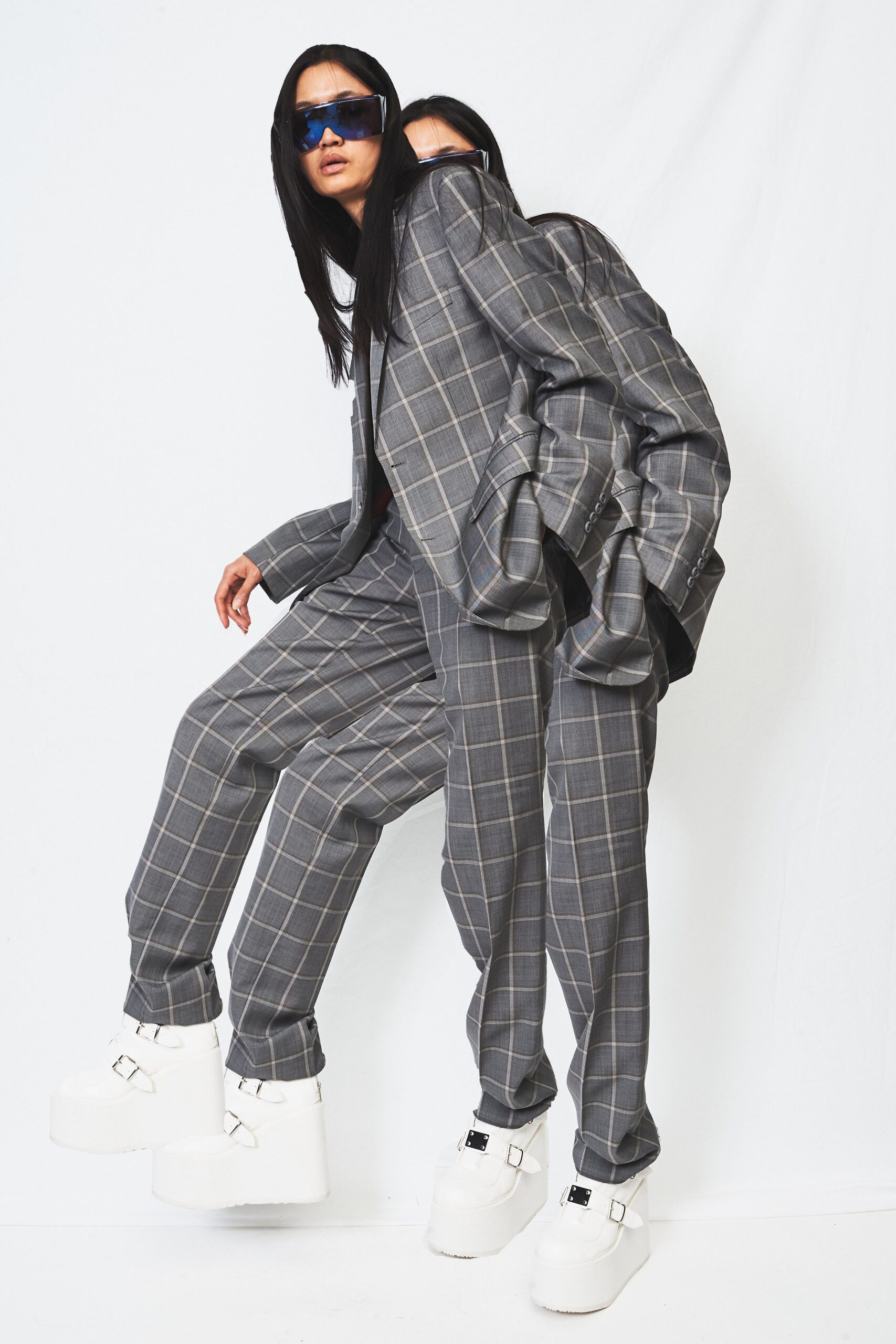 gray checked suit with platform shoes