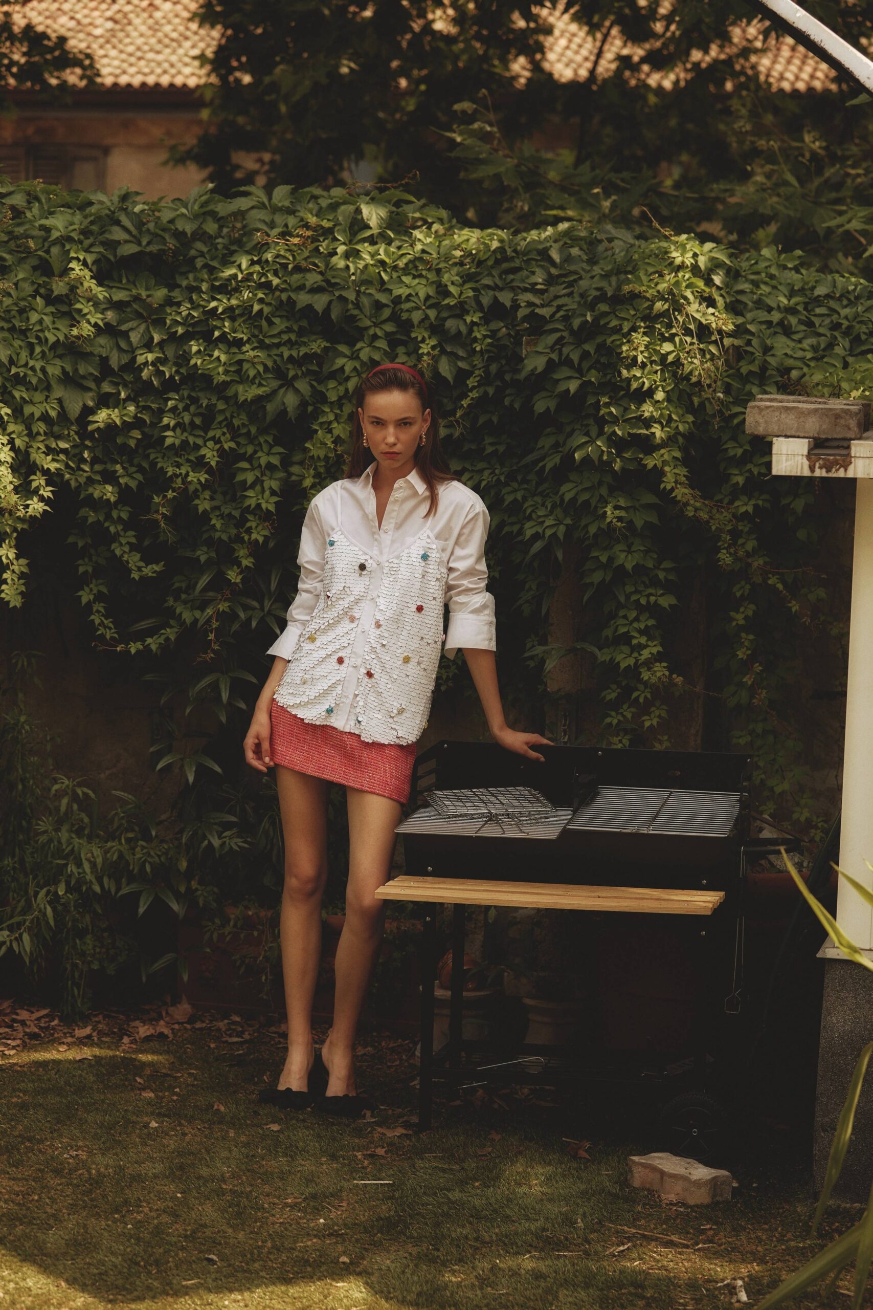 white fitted shirt and pink mini skirt