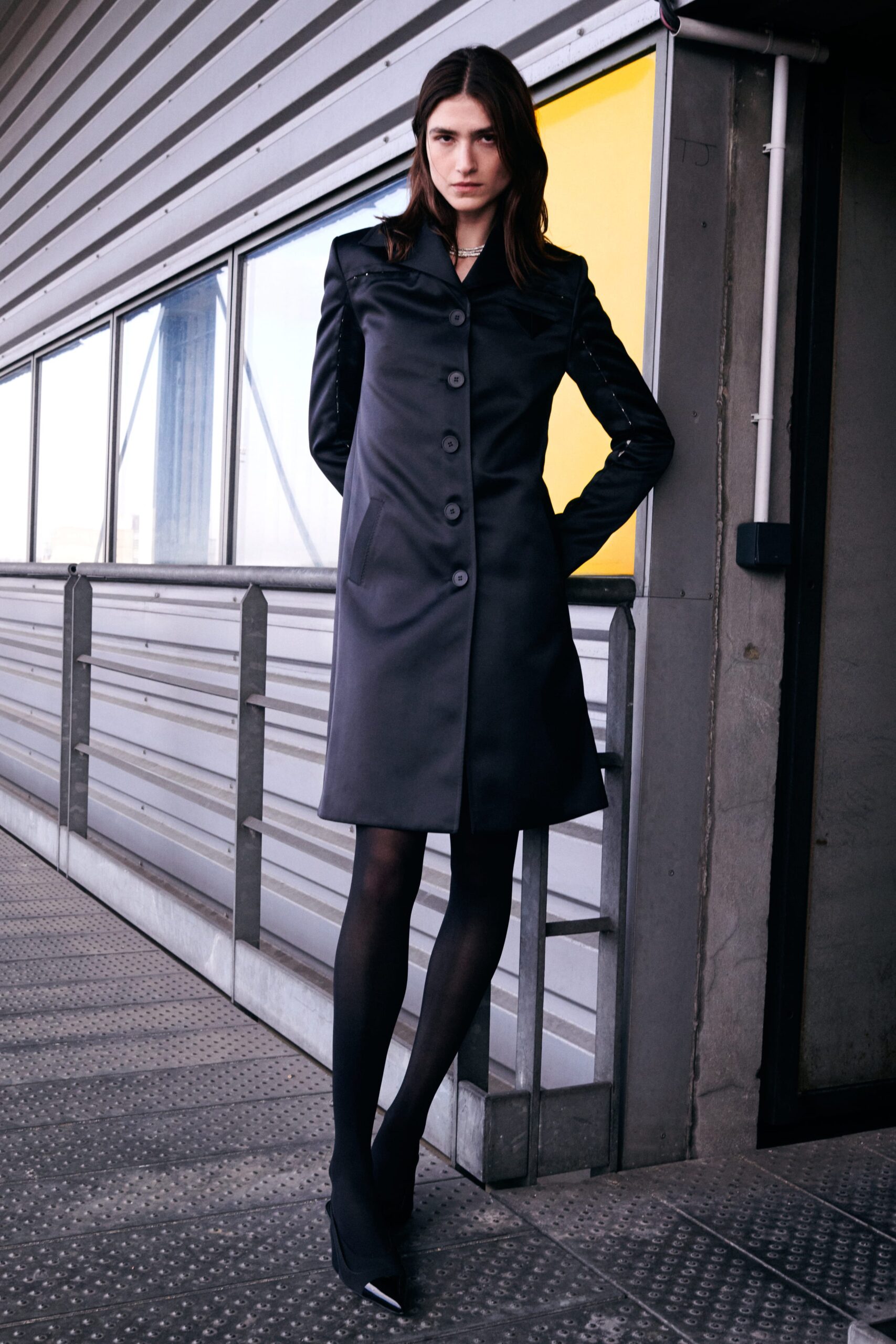 fitted black silk coat