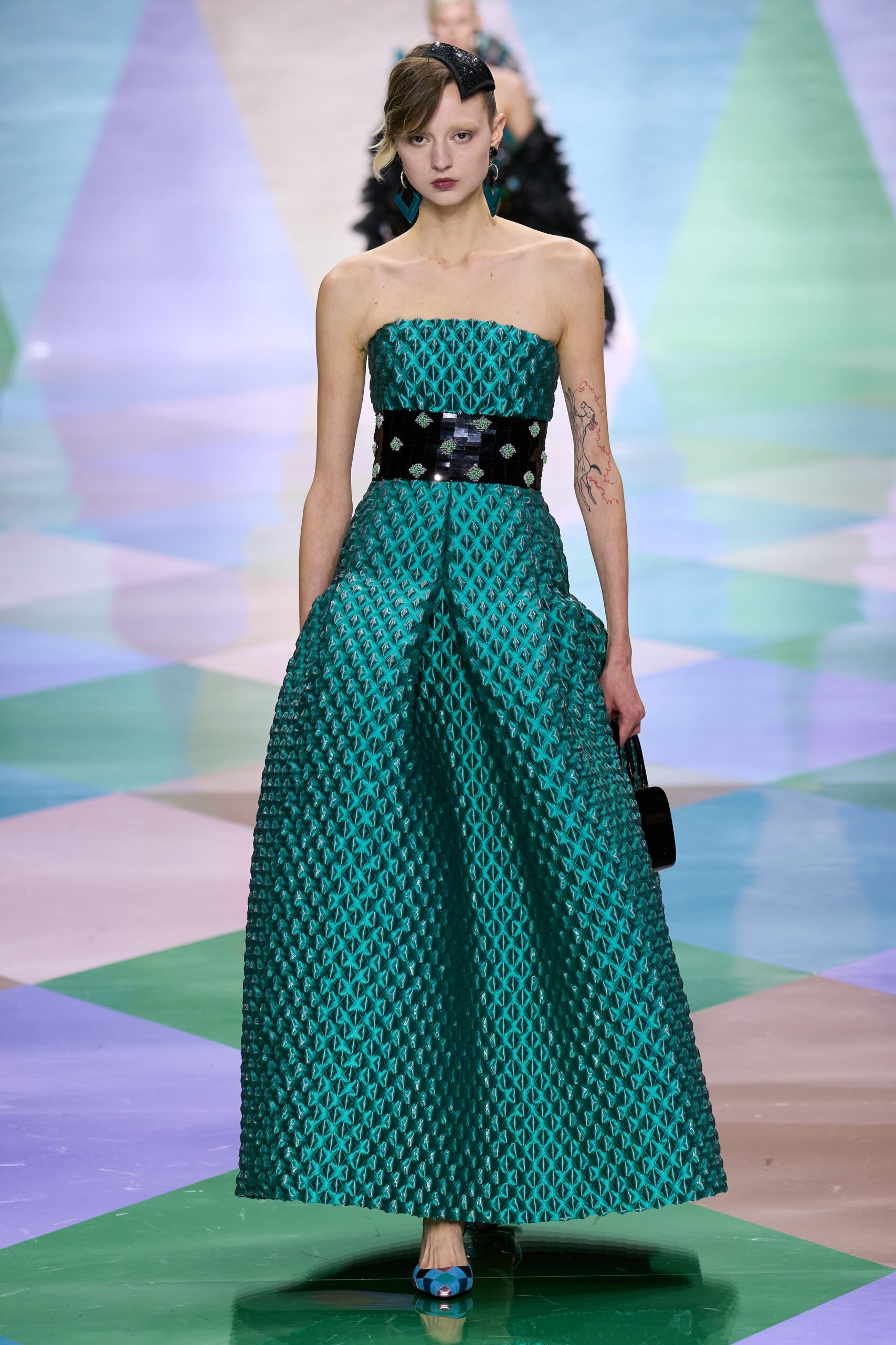 green pleated strapless gown