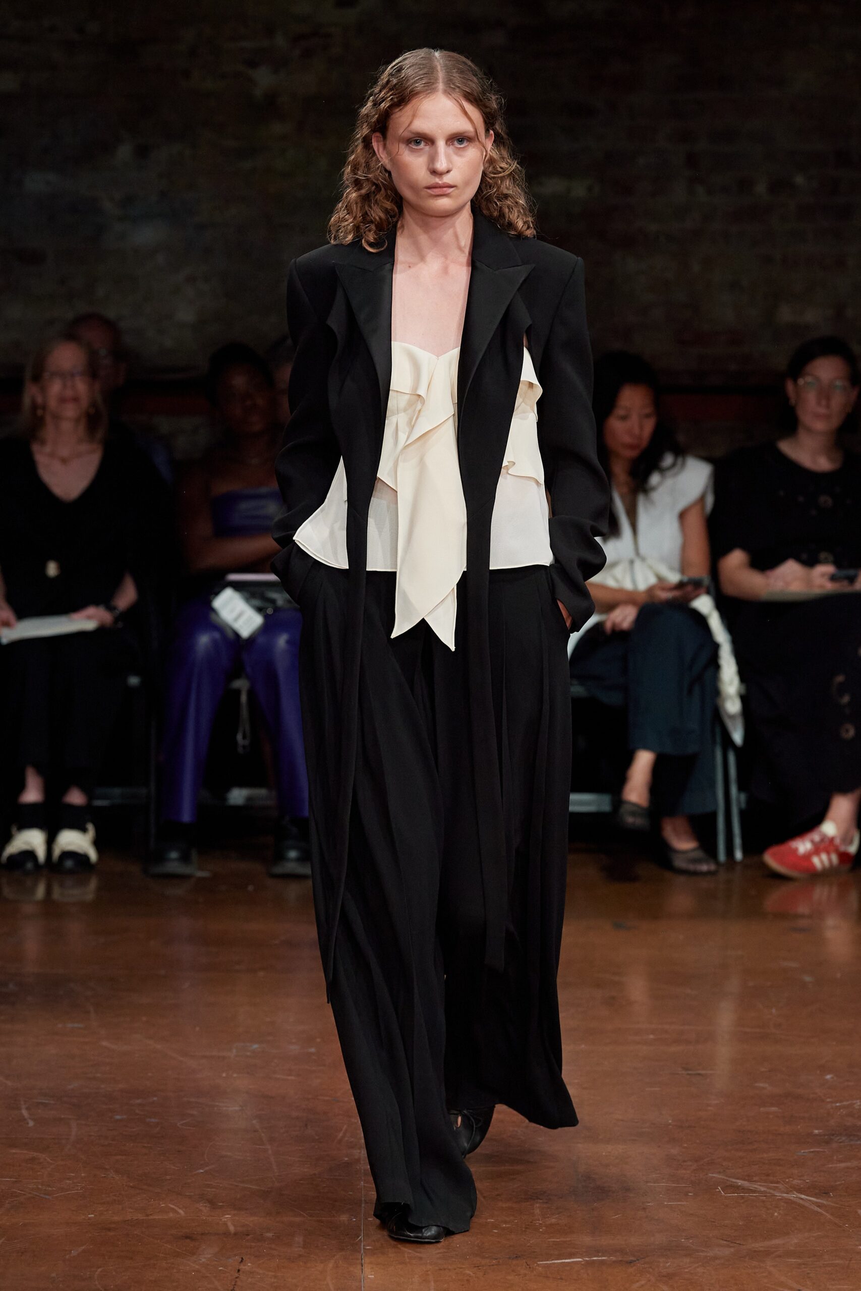 black blazer white ruffled top